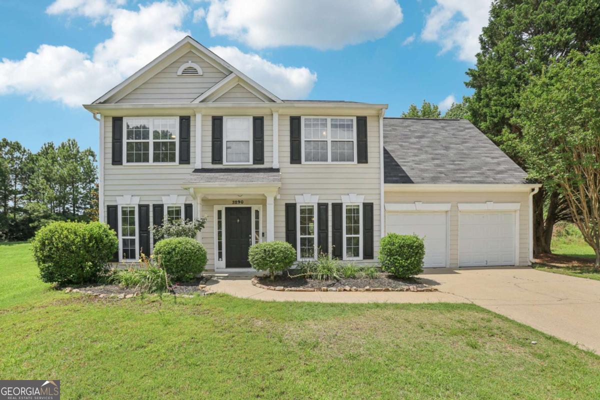 Charming Home on a Quiet Cul-de-Sac! Nestled on a peaceful cul-de-sac, this lovely home offers a stately presence with its sweeping front yard and welcoming curb appeal. Step inside to a spacious foyer flanked by a versatile formal living room or flex space on one side and a formal dining room with elegant chair railing on the other. The heart of the home is the soaring two-story living room, filled with natural light and anchored by a cozy fireplace-perfect for relaxing or entertaining. The kitchen features on-trend white cabinetry, abundant counter and cabinet space, and a bright breakfast room with private backyard views. Conveniently located on the main floor are a laundry room and half bath. Upstairs, retreat to the oversized primary suite, large enough to accommodate a sitting area, nursery, or home office. The en-suite bath boasts dual vanities, a separate soaking tub, a glass-enclosed shower, and a generous walk-in closet. Two spacious secondary bedrooms share a well-appointed hall bath. Outside, enjoy the expansive covered patio-ideal for grilling, dining, or gathering with friends. The large, fenced yard backs to serene woods, offering privacy and plenty of room to play or garden. Book your tour today!