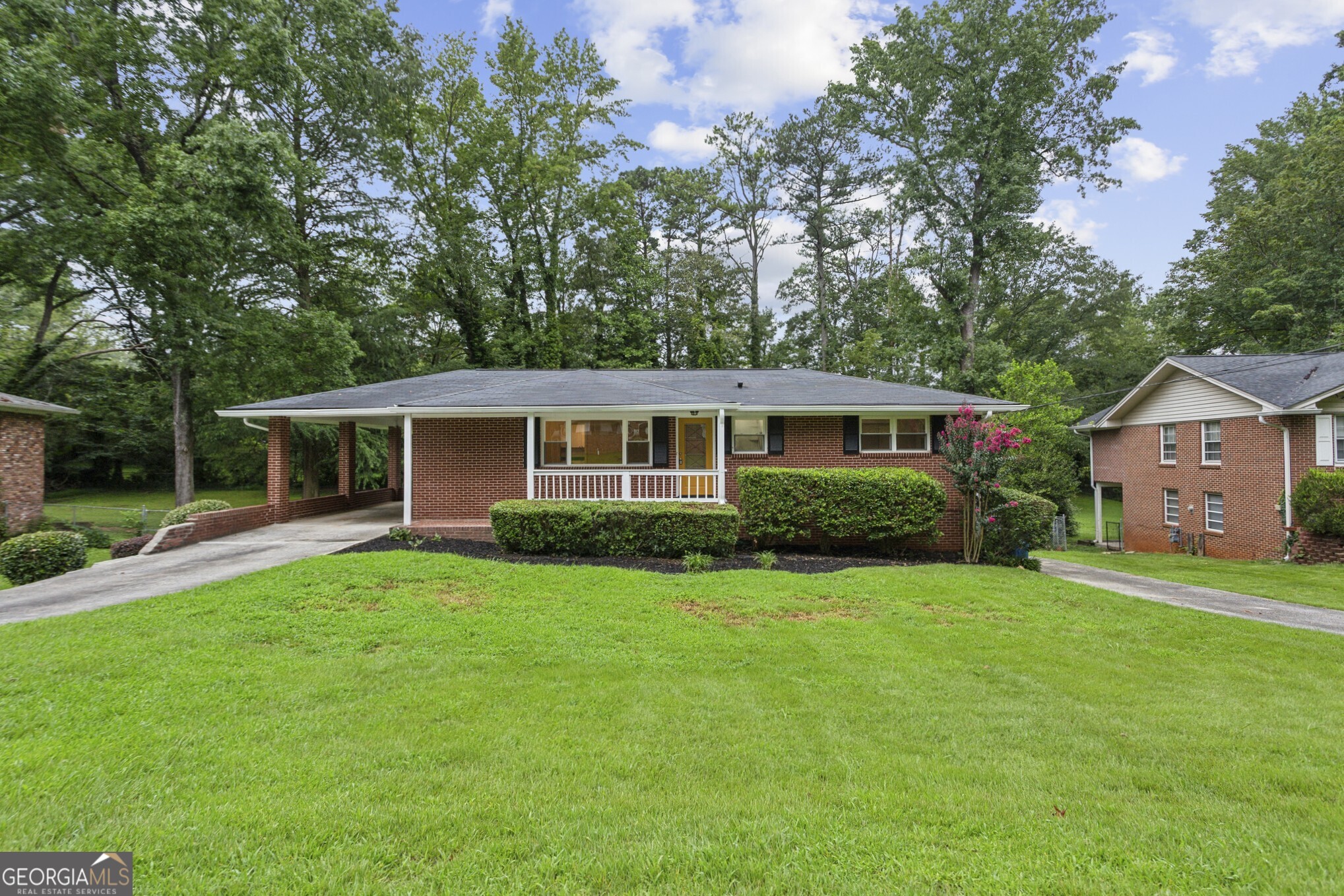 Beautifully maintained ranch in the lovely Connally Estates neighborhood. This home which is so much larger than it looks and has been freshly painted on the interior as well as the exterior. It offers gleaming hardwoods that have just been refinished on the main and LVP flooring on the terrace level. The front door and all interior doors on the main level have been replaced and include sleek black hardware. The windows in the home have been replaced and allow for an abundance of natural light. The bedrooms and bathrooms are located on the main level along with the open living/dining room and spacious kitchen. Let's not forget the bathrooms which have been updated with the primary bathroom in particular bringing a touch of elegance to the primary suite. Not to be missed is the incredible terrace level family room which would make a to die for media room. Loads of parking available with the kitchen level carport as well as the driveway on the right side of the home which takes you to a drive under garage. The lot is larger than it appears as it extends far beyond the fence line in the back. The backyard patio is the perfect place for festivities and enjoying Mother Nature. I could go on and on but I think it's best that you view it today. It is truly move-in ready!