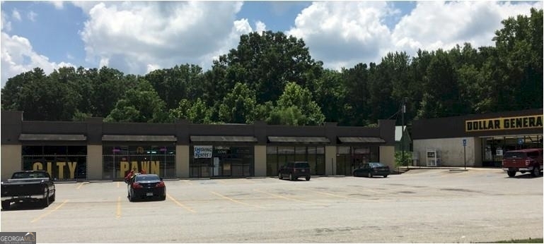 2154 Square feet space (2 units combined) great for retail and office - prime location in busy shopping center next to Dollar General and City Pawn. CAM billed monthly $2 per sq. ft - $359. Contact ashley@novusrentals.com/678.664.1400 for more information!