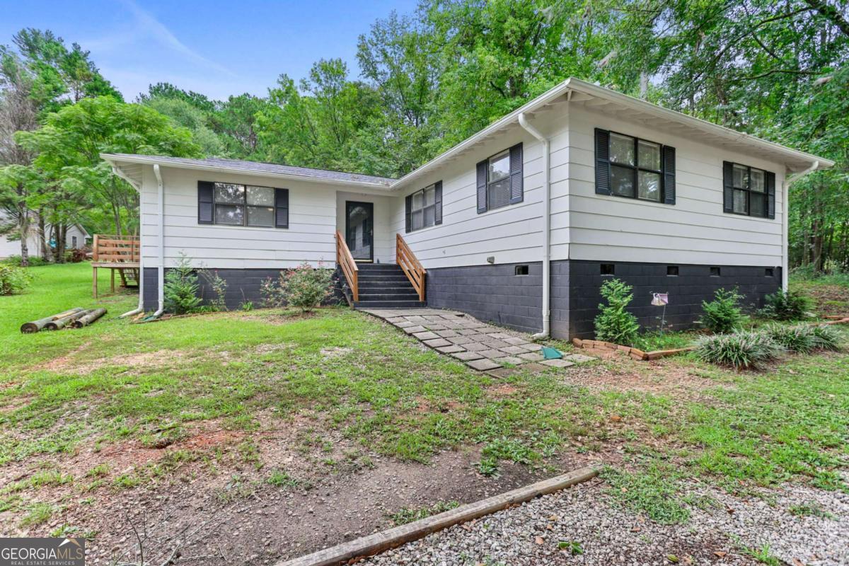 Stylishly Updated Ranch on a Private 3/4-Acre Lot Welcome to this inviting 4-bedroom, 2-bath ranch, perfectly set on a spacious and private 0.75-acre lot. Blending timeless charm with modern upgrades, this home is truly move-in ready. Inside, luxury vinyl plank flooring carries throughout the open layout, creating a seamless and bright living space. The kitchen shines with stainless steel appliances, subway tile backsplash, and abundant cabinetry-ideal for both daily living and entertaining. The primary suite features a fully renovated bathroom with sleek tile finishes and a frameless glass shower. Step outside to enjoy the peaceful backyard, with plenty of room to garden, play, or relax under the stars. Whether hosting friends or savoring a quiet evening, this home provides the perfect backdrop. With fresh updates and thoughtful details throughout, this ranch is ready to welcome its next owners!