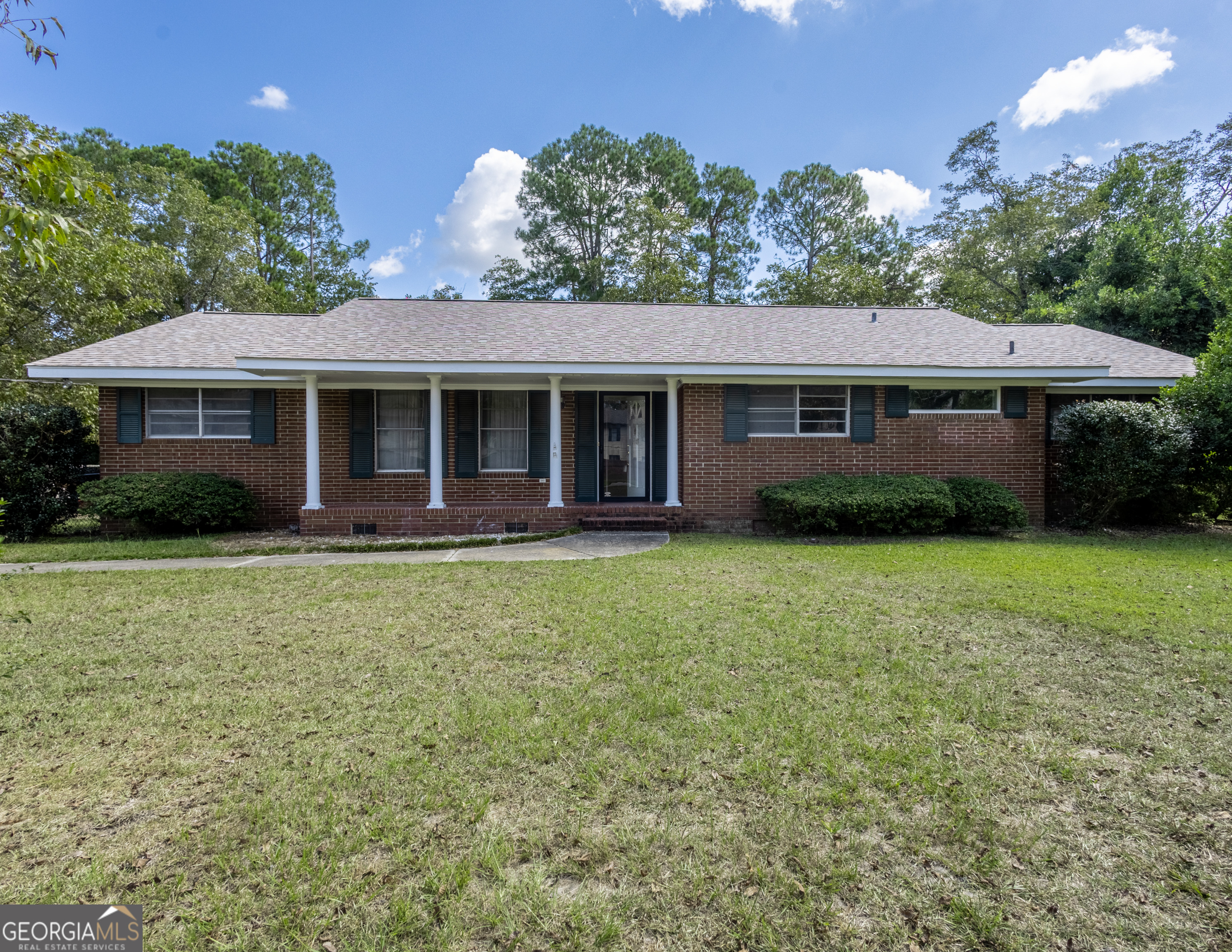 Four bedroom, 2 and half bath home, garage, updated bathroom, soaker tub, modern kitchen tile, family room, dining room, large pantry, washer dryer, hardwood in hall and den & more!