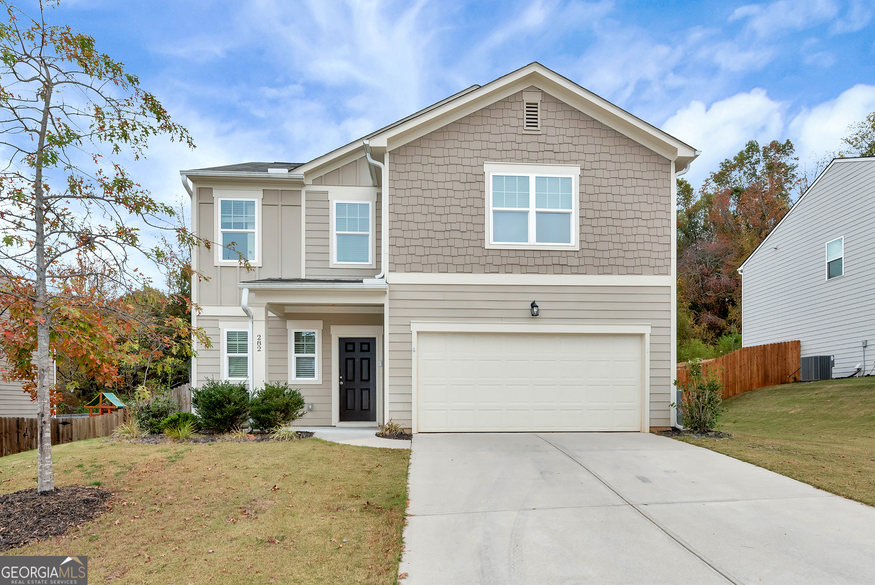 Welcome home to this immaculate two-story, 4 bedroom, 2 1/2 bath home. Kitchen with granite countertops, stained cabinets, pantry, and stainless-steel appliances, including a microwave and electric range. Flowing seamlessly into the dining and living areas, the main floor features luxury vinyl plank (LVP) flooring and a half bath. 2 car garage conveniently located off the kitchen. Upstairs, the master suite offers a double vanity, a tub/shower combo, and a large walk-in closet. YouCOll also find three additional bedrooms, each with walk-in closets, a full bath with a tub/shower combo and laundry room. Step outside to enjoy the privacy of the fenced-in backyard, ideal for gatherings, gardening, or play. Located just minutes from schools, local dining options, and shopping, this home puts you close to all that Dawsonville has to offer with access to GA-400 and HW 53.