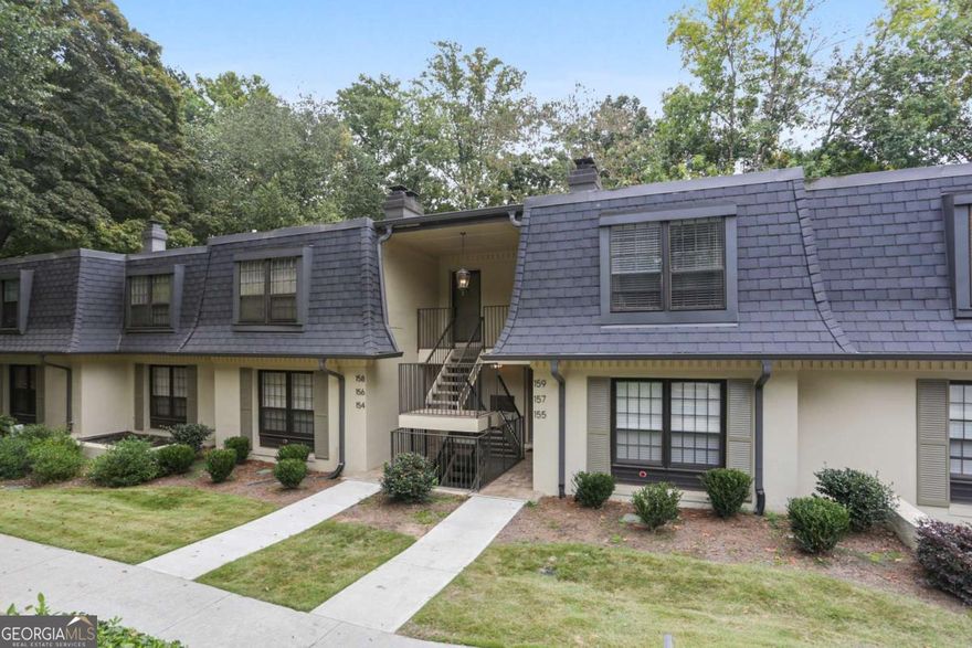 INVESTOR ALERT Solid Huge Cross Creek Condo with Wood Burning Fireplace.  All systems replaced in 2017. Light and Bright with Hardwood Floors and Crown Moulding. Strong long term tenant with options to renew. Great investment condo for the price. Tenants Love Living the Country Club Life at Cross Creek!  This is the largest 2 bedroom flat floorplan in the community! A welcoming foyer welcomes visitor with a tucked-away coat closet that leads to a spacious, light-filled living room complete with a cozy wood-burning fireplace. Lives large with attached dining room and seperate sunroom. The expansive primary suite with private bath, a second bedroom, and updated hall bath round out this must-see condo home. All of this inside Atlanta's gated Cross Creek community, where the amenities are second to none: 18-hole par 3 golf course, three pools (two saline), lighted tennis courts, pickleball, gym, EV charging, cafe/bar, and 24/7 manned Gatehouse. Country club living at a price you and your tenants will love!