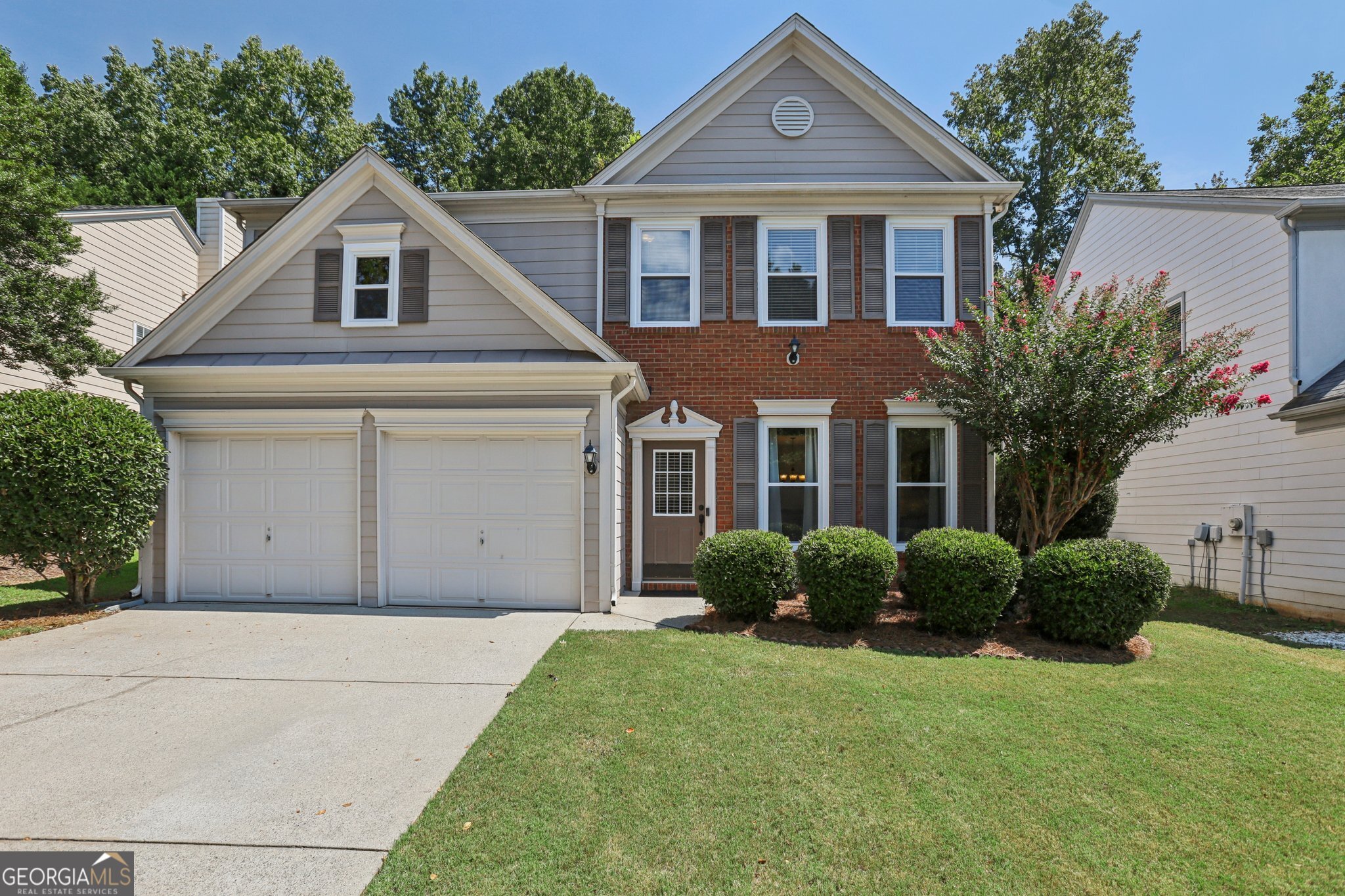 I wanted to share an incredible opportunity to live in Johns Creek, Georgia! This beautiful home is located in the esteemed and private swim/tennis neighborhood of Wellington, on a quiet cul-de-sac street with minimal traffic. As you step inside, you'll be greeted by an updated interior featuring new windows, fresh paint, and new LVP flooring throughout the main level. The spacious formal living area is bright and open to the formal dining area. The updated kitchen boasts a beautiful custom tile backsplash, stainless steel appliances, granite countertops, abundant cabinet and counter space, and tile floors. It flows into a breakfast nook and a two-story fireside family room filled with natural light. From the family room, breakfast nook, and kitchen, you'll overlook a private, flat backyard that has been freshly seeded and features an extended patio with a large, beautiful hot tub, all easily accessible through new sliding glass doors-perfect for entertaining. Upstairs, the primary suite is spacious and offers double vanities, a spacious walk-in closet, and a separate tub and shower. Two more well-sized bedrooms and a conveniently located laundry room complete the second floor, each bedroom has been freshly painted. This home is situated in the Chattahoochee High School district, with Findley Oaks Elementary just a three-minute walk away. It's also conveniently located near Emory Johns Creek, Webb Bridge, Lifetime Fitness, various shopping centers, restaurants, grocery stores, and more. You'll have easy access to GA-400, 141, The Collection, Avalon, and Halcyon. Come see for yourself why this home won't last long in this coveted Johns Creek community!