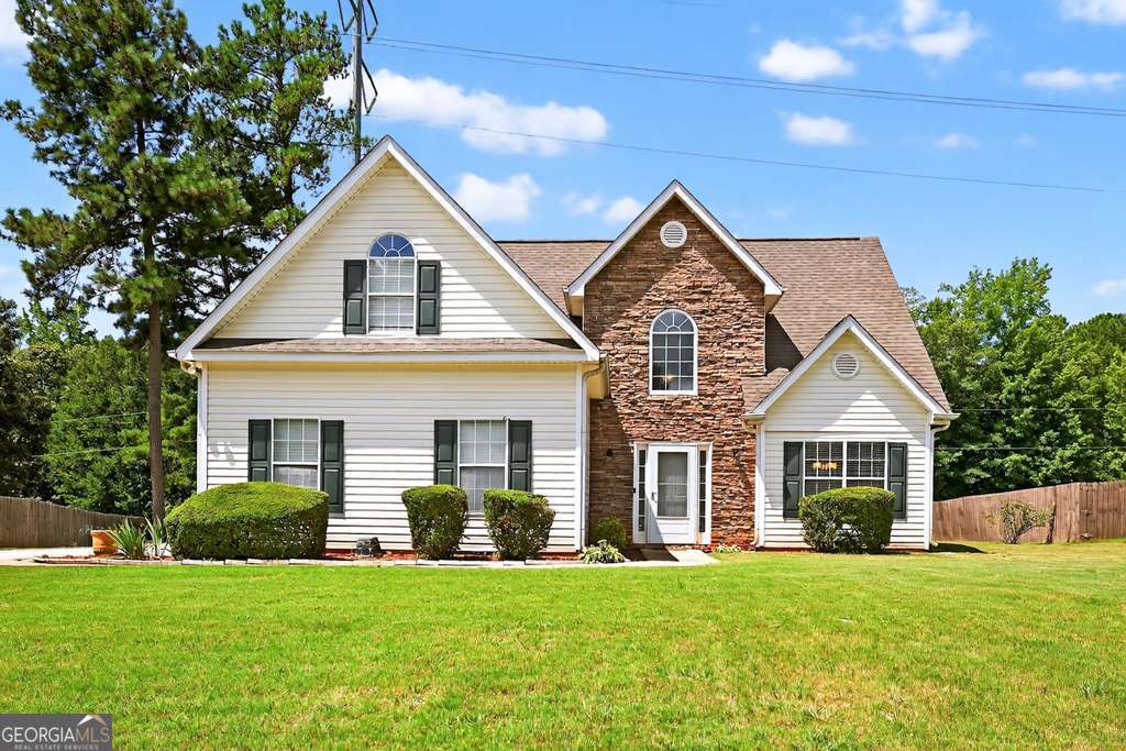 Gorgeous Home in Union Grove School District! Welcome to 941 Arbor Way - located in the highly sought-after St. Andrews at Rockport community. This beautifully maintained 4-bedroom, 2.5-bathroom home truly has it all. Step inside to soaring ceilings and an open staircase that overlooks the spacious living room. The vaulted ceilings and natural light will take your breath away. Enjoy luxury LVP flooring and plush carpeting throughout the home, adding both comfort and style. The brand-new kitchen is a chef's dream - featuring sleek granite countertops, white shaker cabinets, stainless steel appliances, a breakfast area, and ample cabinet space for storage. The owner's suite on the main level offers a peaceful retreat, complete with a luxurious bathroom that includes granite counters, a soaking tub, and a separate shower. Upstairs offers three spacious bedrooms with walk-in closets and additional bathroom. These rooms provide comfort and flexibility-ideal for guests, a home office, or hobbies. Step outside onto the patio and enjoy the beautiful, fenced backyard - perfect for entertaining and relaxing with family and friends. Don't miss your chance to own this stunning home in an unbeatable location. Schedule your showing today - this one won't last long!
