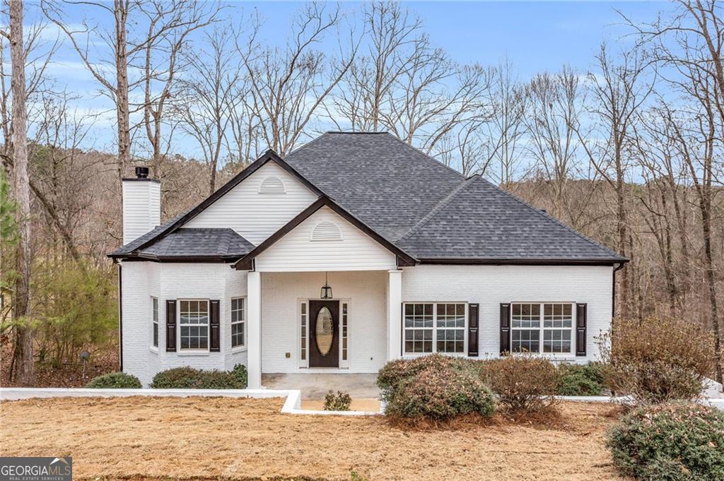 Welcome to this stunning 4-bedroom, 3-bath split-level home in the sought-after Graham's Port neighborhood of Snellville. Perfectly situated on nearly 1 acre, this residence combines modern design, flexible living spaces, and premium upgrades throughout. A highlight of the property is the newly built Accessory Dwelling Unit (ADU) with its own private entrance, full kitchen, bathroom, and two spacious bedrooms. Perfect as a mother-in-law suite, guest house, long-term rental, or short-term rental, it offers excellent versatility and income potential. Inside the main home, you'll love the soaring 12-foot ceilings and open-concept floor plan that seamlessly connects the bright kitchen, island, and living spaces. The owner's suite features double walk-in closets and a luxurious ensuite with soaking tub, separate shower, and dual vanities. Two secondary bedrooms share a beautifully updated bath, while the finished lower level provides another large bedroom, bonus flex room, and media/theater space. Outdoor living is just as impressive, with a huge double deck overlooking a serene creek and private backyard-perfect for entertaining or relaxing in nature. Every detail has been carefully designed, with modern finishes, newer systems, and move-in ready updates. Conveniently located close to shopping, dining, and major highways, this property is the perfect blend of comfort, convenience, and opportunity.