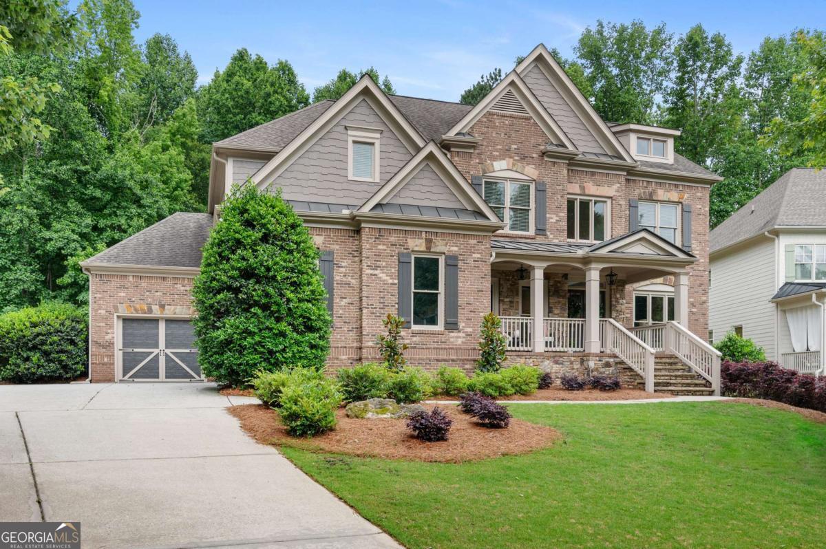 Showcase listing in highly sought-after Lake Forest! Updated throughout and offering three finished levels; this exquisite 6 bedroom, 5 bathroom Vickford floorplan by Waterford homes boasts three fireplaces and sits on a sprawling 1.06 acre private wooded lot. Gorgeous, updated kitchen with quartzite counters, custom handmade brick backsplash, upgraded appliances and designer hardware. Fireside keeping room with built-ins extends the flow of the kitchen. Bedroom on the main with full bathroom- perfect for guests or as quiet home office! Beautifully refinished hardwoods on main level! Ascending upstairs, the oversized primary suite offers a sitting area and views to the huge backyard. Granite vanity and stone and tile accents compliment the spacious master bathroom. Open concept bonus room is adjacent to the jack n/ jill bedrooms and guest suite which features a private update bathroom. Descending to the basement level, the spacious finished area offers many uses including an updated bathroom, bedroom, 2 recreational areas, a child's built-in playhouse or reading nook and plenty of extra storage space! Huge, fenced yard with plenty of green space and private tree line. Resort style amenities including access to Twin Lake with a dry dock and boat ramp, Jr. Olympic sized pool with kids splash zone, seasonal swim team, lighted tennis and pickleball courts, full basketball court, sand volleyball and a playground! Zoned for award-winning schools!