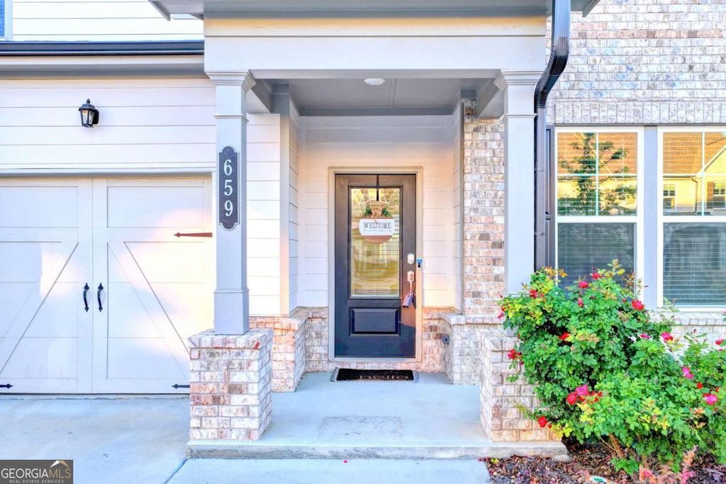 Photo of 659 Caryle Trail Lane, Loganville, GA 30052 (MLS # 10743042)