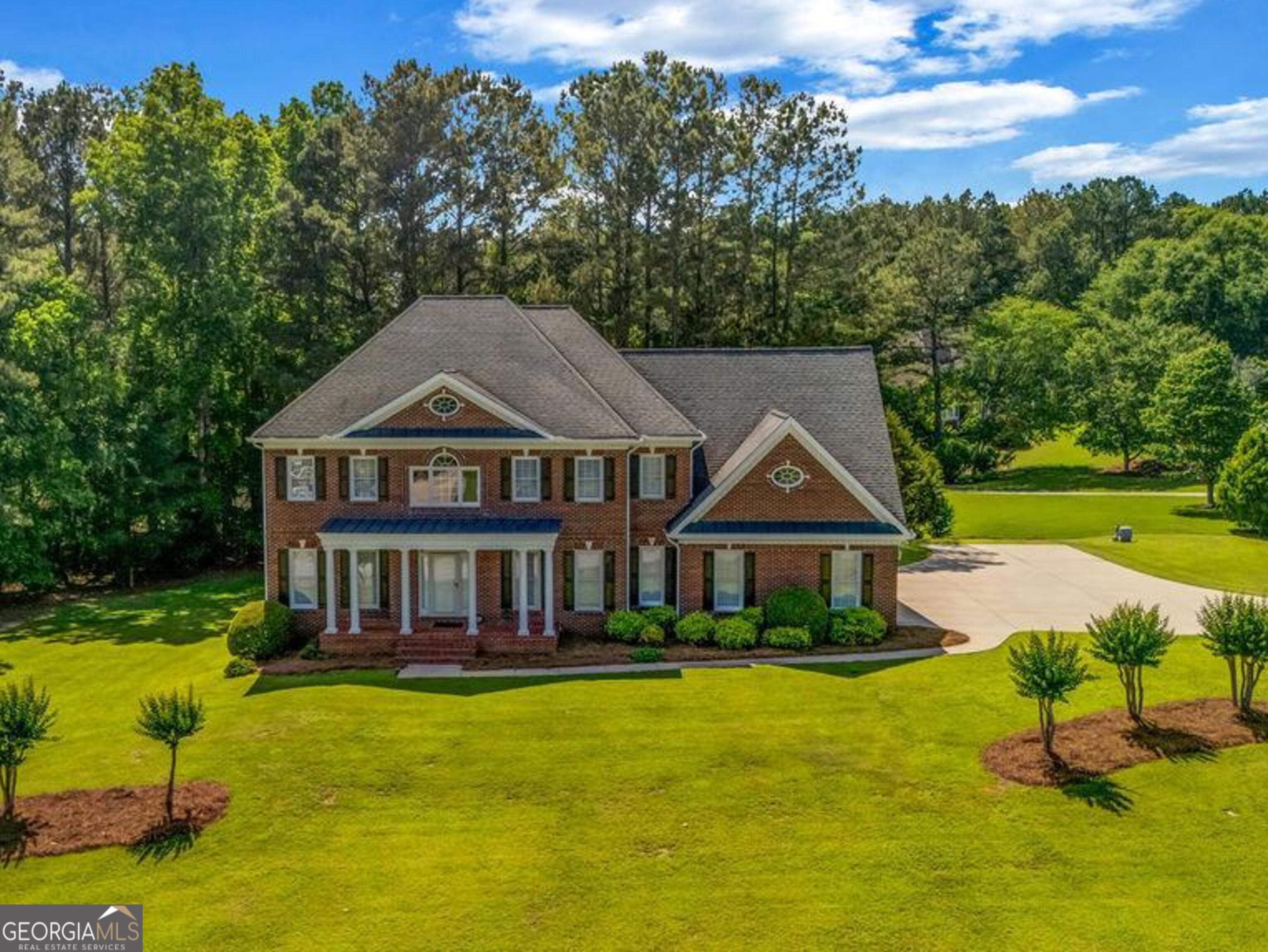 Location AND Space to grow in this 6BR/4BA Four-Sided Brick Home on 1.14 Acres in Sought-After Legacy Downs! This custom-built, 3,700+ sq ft beauty also features a formal DR, Den, Family Room, and an unfinished basement ready for your personal touch. (Plumbing already in place for bath and laundry.) Think home gym, theater, or in-law suite! There is enough room for ALL options, plus a boat door for extra equipment or toys! Enjoy hardwood floors, high ceilings, crown molding, a kitchen with quartz countertops, and flexible space including a main-level guest suite. The private lot offers a 3-car side-entry garage, covered front porch, and serene back deck-perfect for relaxing or entertaining. Located minutes from downtown Covington, Cherokee Run Golf, and the Georgia International Horse Park, this home is a rare find in a well-maintained community with easy access to I-20, hospitals, shopping, & of course restaurants in all directions, making this one easily PickiVicki Approved! See why Legacy Downs is one of Oxford's best-kept secrets! Schedule your appt and ask about 100% Financing options for approved Buyers. **NEED ALARM CODE TO VIEW**