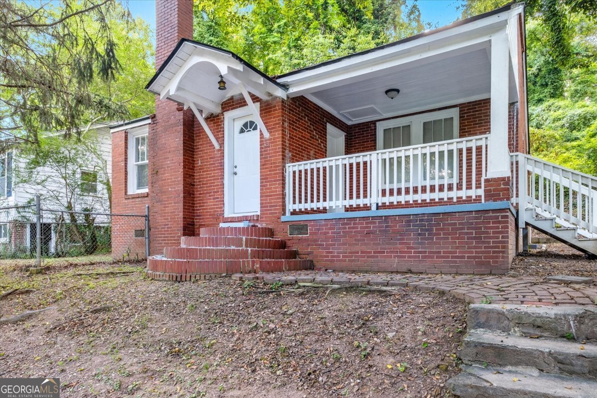 Check out this newly updated property at such an affordable price! This brick house has been updated with new paint, flooring, kitchen cabinets, new appliances, plumbing, and more! The beautiful fire place adds a touch of elegance. Although the house has been updated, the vintage charm is still present with the original wood doors and curved archways. Centrally located just minutes away from downtown Rome, with quick access to nearby shops and restaurants too! The neighborhood also features a community playground nearby. This home is ready for its new owners; available to view now!