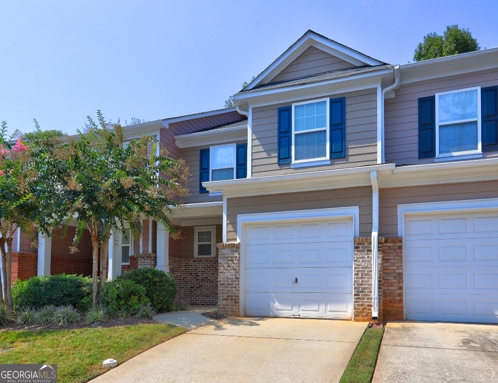 Location, Location, Location. This beautiful townhome is located in Dominion Station. Only minutes away from downtown Decatur. Welcome home to this stunning, move-in-ready 3-bedroom, 2.5-bathroom townhome! Upon entry, you're welcomed by a spacious foyer that opens to a bright, airy floor plan, with hard wood floors throughout main level. The expansive living room offers the ideal setting for gatherings, relaxation, and entertaining. Flowing from the living room, the dining area connects seamlessly to the kitchen, which boosts ample cabinets, counter space, and abundant natural light from the adjacent patio. The kitchen also features a large breakfast bar and space for a dining nook. Upstairs, the owner's suite impresses with vaulted ceilings, a walk-in closet, and a generously sized bathroom complete with a soaking tub, double vanities, and a separate shower. Two additional bedrooms provide spacious closets and extra storage, and a large secondary bathroom and convenient laundry closet complete the second floor. This peaceful community is just a short walk to the brand-new Electric Owl Studios and the Indian Creek MARTA Station, while only 15 minutes from downtown Decatur's lively shopping and dining scene and the DeKalb Farmers Market. Enjoy proximity to fitness centers, restaurants, grocery stores, banks, and more just minutes from your door. Schedule your showing today and make this beautiful townhome yours!