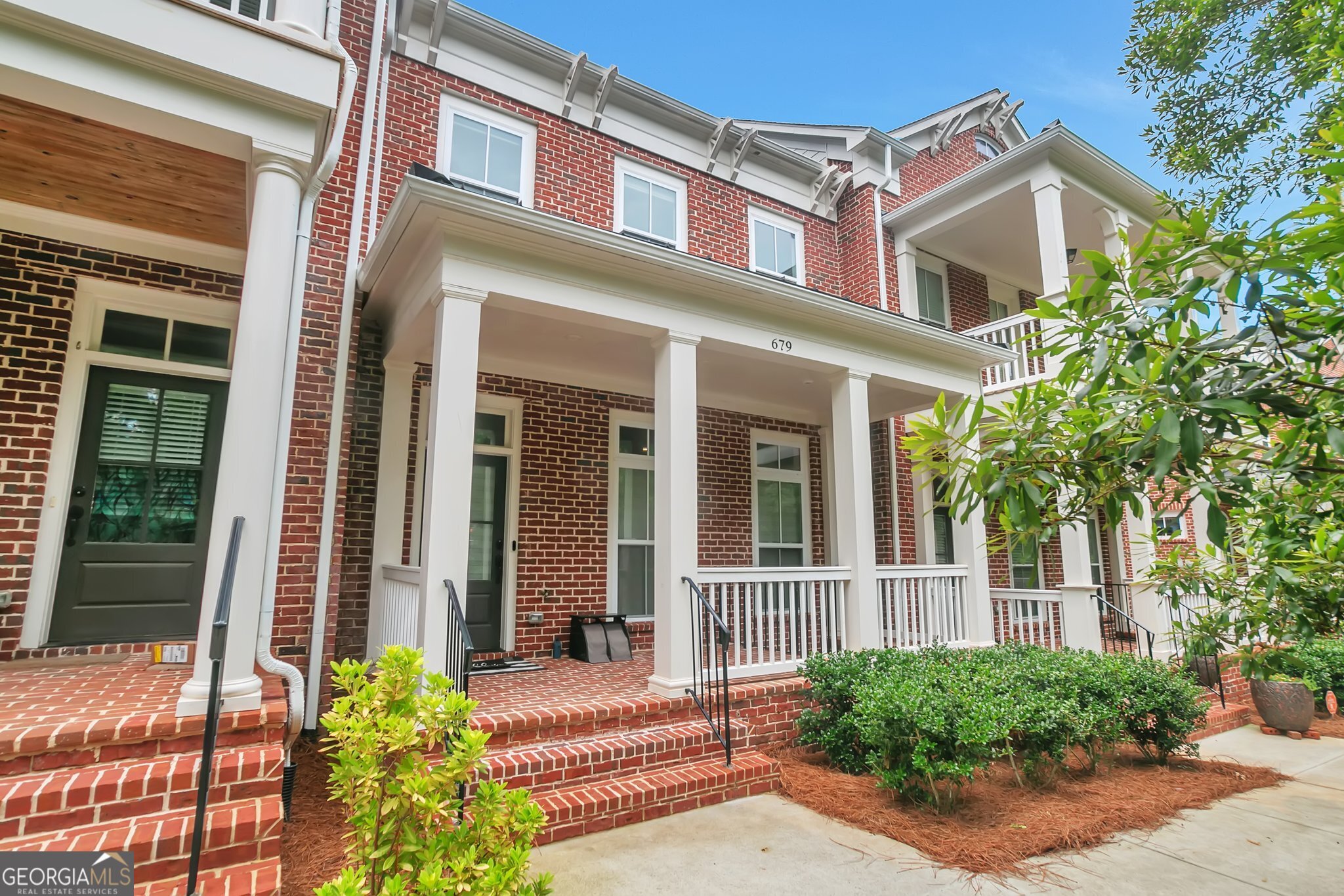 Stunning John Wieland Community in the most premium Decatur location! Upgrades to home include Closet by Design closets, dimmable lights, added ceiling fans, pantry shelving. Home freshly painted and shows like new! This luxury townhome features a spacious master bed + bath with oversized shower on the top level. Upper level has 2 additional bedrooms + full bath & laundry. The 4th bedroom is ensuite on the bottom level - ideal for teens, family or guests. In city generous parking - 2 car garage, 2 cars in driveway and several guest parking spots! Enjoy a peaceful morning coffee or yoga session on your private covered porch, which welcomes you into a bright, open concept main level with hardwood floors and 10-inch ceilings, perfect for entertaining. Inviting chef's Kitchen features High-End Appliances, including a brand-new refrigerator, quartz countertops, Huge Island with storage, breakfast bar, breakfast nook, Dining area, living room with Fireplace and extensive built-in shelving and cabinetry. Half bath conveniently located off main level. Seeing is believing! Come see and experience exceptional living in this beautifully upgraded townhome today!
