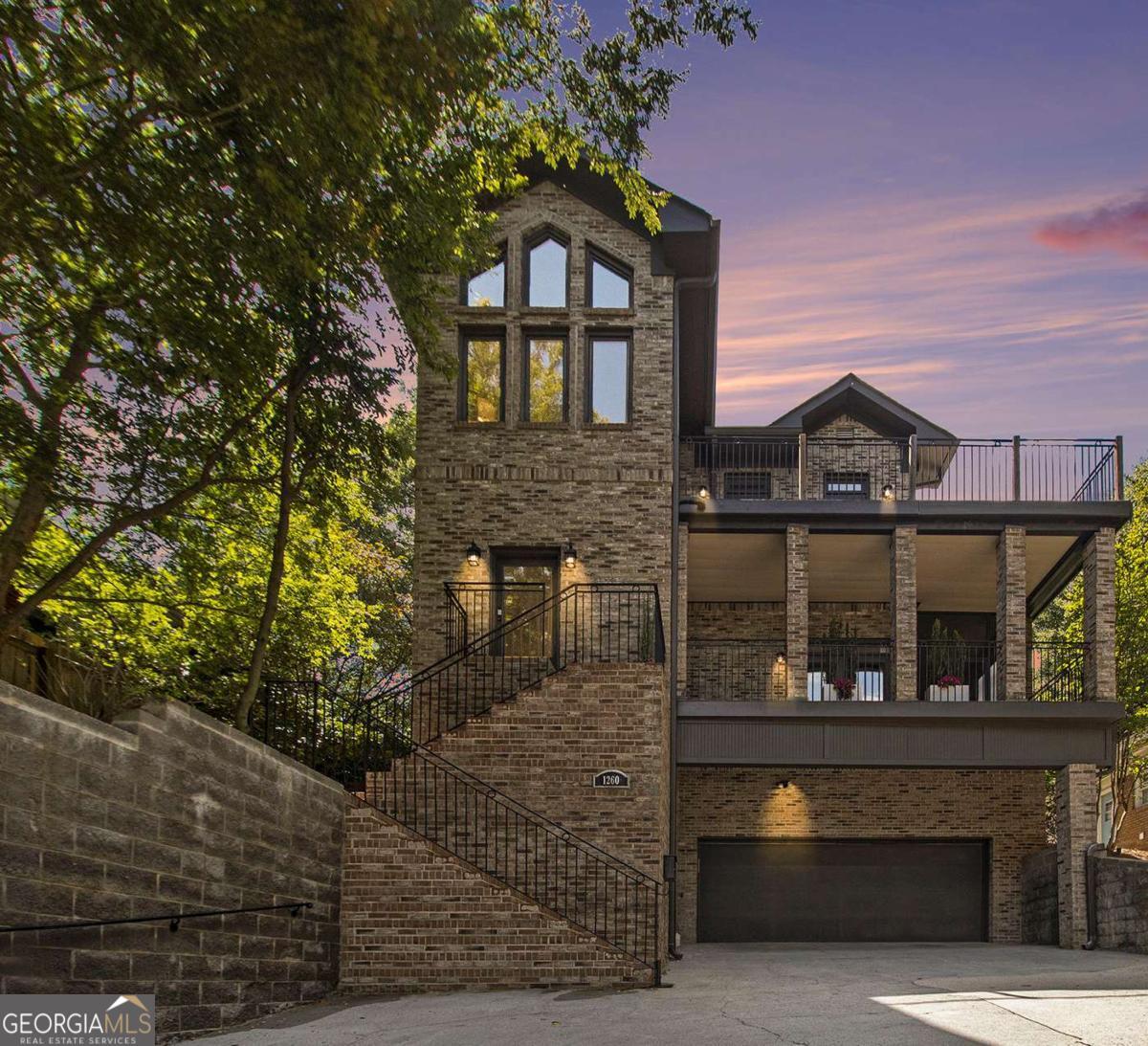 Super Cool Morningside Home with Clean Modern Vibe, Enjoys Ideal Location, just Steps from the Beltline, Piedmont Park, Botanical Garden & all of Intown's Very Best Attractions. 3 Large Bedroom, plus Separate Home Office. All rooms are large, ceilings are High, a Walkout Level Private Backyard from Main Level, with Astroturf . This is an Outstanding Price for this Property, Loaded with Square Footage & Style, Multiple Outdoor Areas, Including Screen Porch with Hot Tub. This Property is in Move Right in Condition, New Carpeting, Fresh Paint, Extensive Landscape Lighting, Oversized 2 Car Garage with Charger, Abundance of Storage, with Oversized Storage Room, Space for Exercise Equipment, a True Dedicated Home Office, Backyard is a WOW, with Level Walk Out From Main Level, Fully Fenced, Backyard is a 10+ plus.