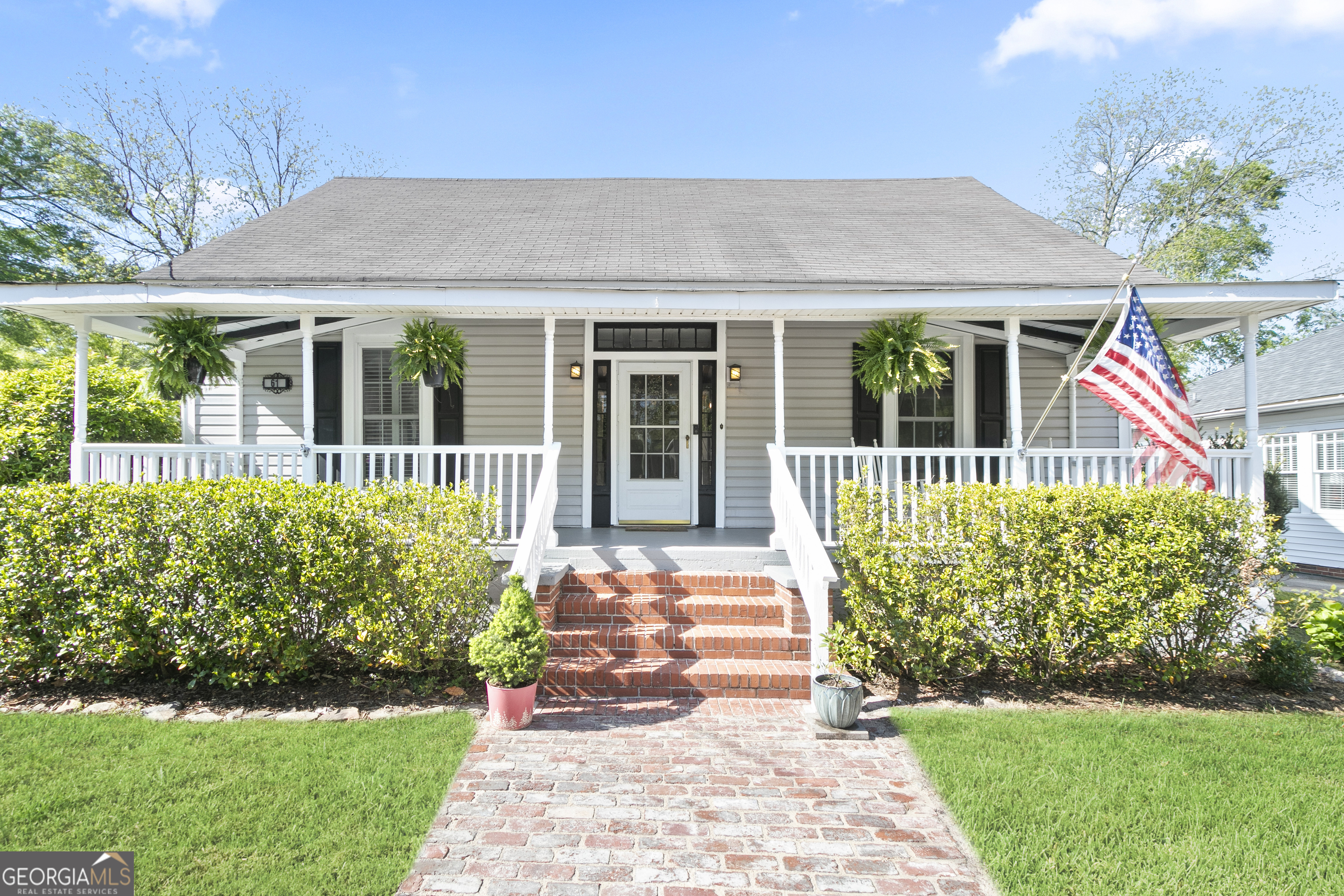 This spacious mid-century bungalow is true walking distance to historic downtown Newnan and Elm Street Elementary. Closets and extra storage space are everywhere you look. The French country kitchen glows with natural light and features a nearby built-in coffee bar with a granite counter. Downstairs windows feature custom-built plantation blinds. The master bedroom on the first floor offers a separate dressing area, and the first floor also has an office / play room. Upstairs there is privacy - it was completely remodeled last year to include two bedrooms, a full bath, and a mini-split for zone temperature control. The backyard has a large patio and fenced yard with fruit-bearing apple & pear trees and blueberry bushes. The large shed has power and water. Many, many recent updates and systems checks (water, foundation, electric).