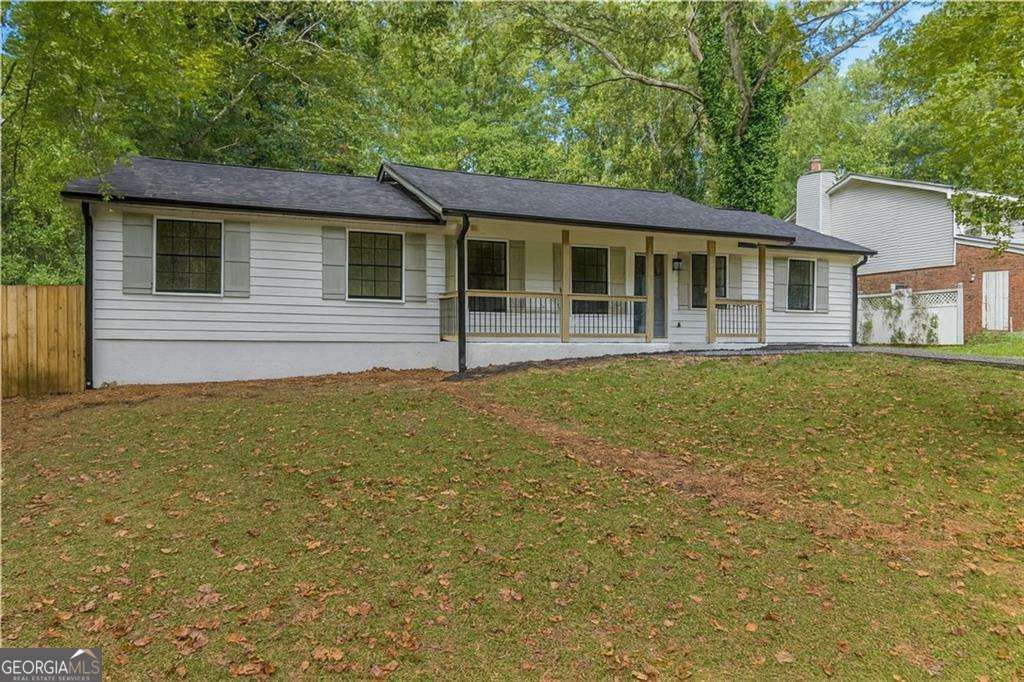 Photo of 8949 Raven Drive, Jonesboro, GA 30238 (MLS # 10664233)