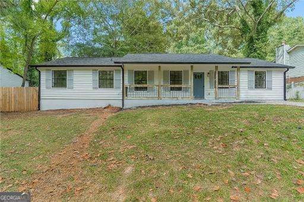 Photo of 8949 Raven Drive, Jonesboro, GA 30238 (MLS # 10664233)