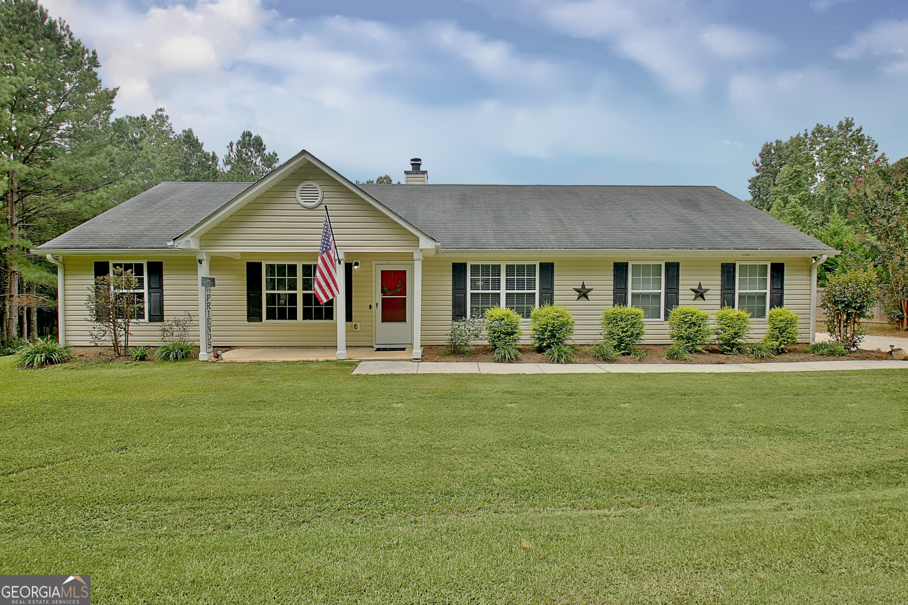 100% USDA Financing Eligible. Charming Ranch on Nearly 5 Acres in Sharpsburg! Tucked away on a private drive, this move-in ready home offers the perfect blend of country living, privacy and convenience--just 15 minutes to both Peachtree City and Newnan. Step inside to an open, airy layout with vaulted ceilings, laminate flooring and a cozy fireplace that anchors the living space. The large dining area easily accommodates a full-size table for gatherings, while the kitchen shines with stainless steel appliances, a spacious pantry, and direct access to a versatile bonus room with closet off the garage--ideal as a 4th bedroom, office, or second living area. The split-bedroom plan gives the primary suite extra privacy, featuring a generous walk-in closet and a spa-like soaking tub. Two additional roomy bedrooms with deep closets and a full bath are located on the opposite side of the home. Outside, unwind on the back porch with extended concrete spanning the entire length of the home-perfect for morning coffee or evening sunsets. The backyard is a dream with a sparkling pool, fire pit, storage shed and a recently added 30 ft concrete slab perfect parking for an RV/Boat and built to support a future shop with an automotive lift. Venture further back and discover even more level, cleared land ready for your imagination-gardens, rv recreation or space to roam. Sellers are including Newer Refrigerator, Front-Loading Washer, Dryer and Outdoor Gazebo. This is the rare combination of peaceful country charm and easy access to everyday amenities. Don't miss your chance to make this your next home!