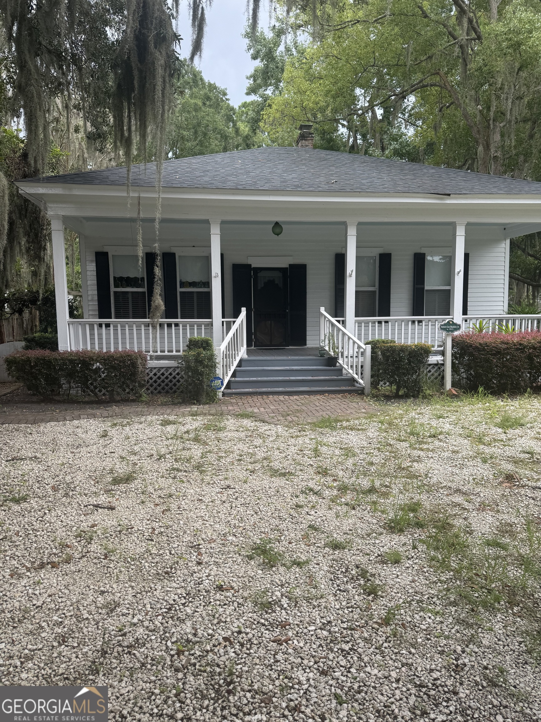 A BUNGALOW/COTTAGE STYLE HOME THAT EXUDES CHARM, WARMTH AND SO MUCH MORE AND IS ONLY 3 BLOCKS FROM THE WATERFRONT. Hardwood floors throughout, 9+ ft. ceilings in a portion of the home, two fireplaces, and two nice size screened porches are just a few of the special features this home offers. There are two bedrooms three baths on the main level and one bedroom upstairs. The large front porch, is a great place with the shade from the beautiful trees, to enjoy a drink and peaceful afternoon.