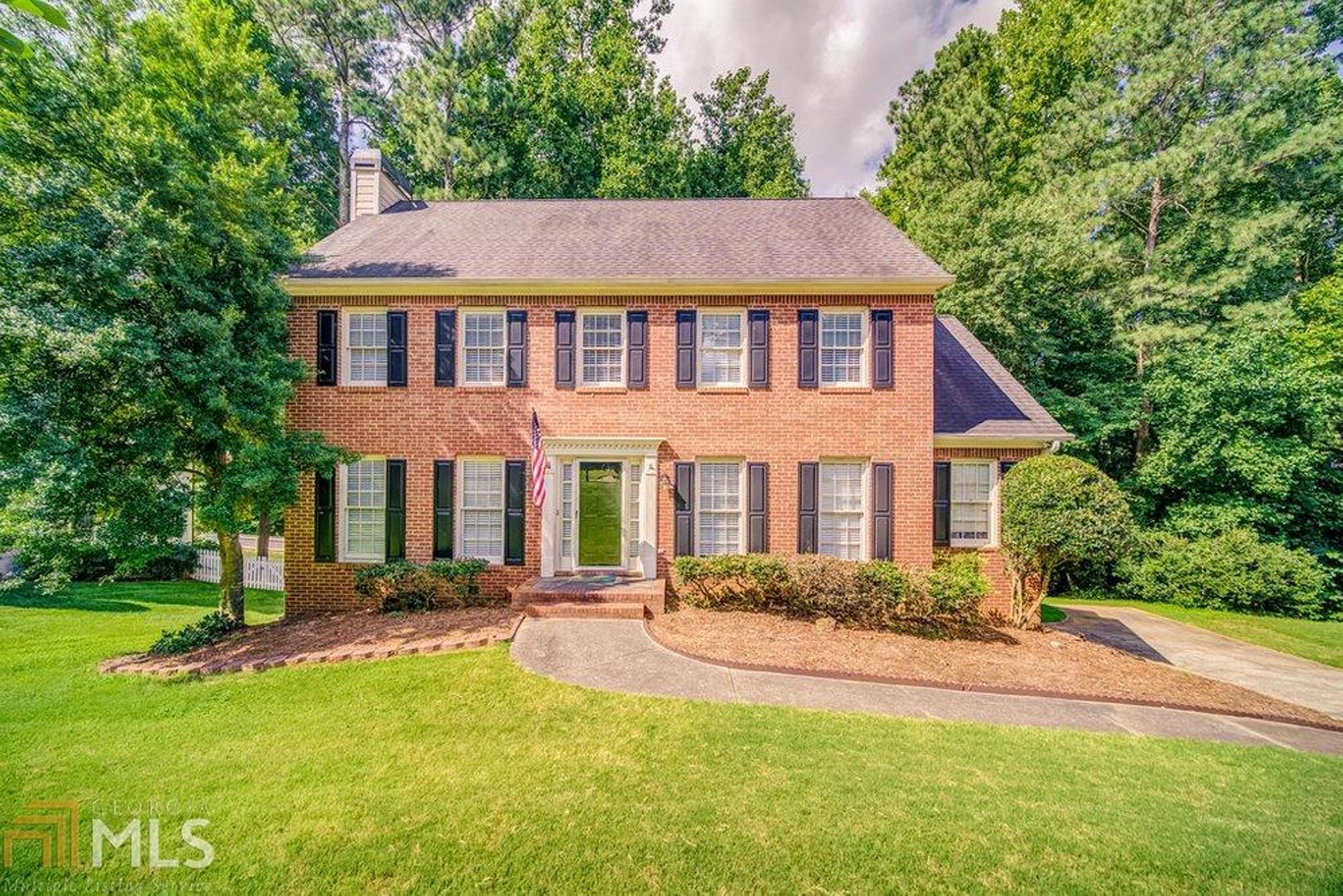 You will love this large beautiful brick front home situated on a gorgeous private wooded lot zoned for straight A schools!!! The spacious great/family room features a beautiful gas assist, wood burning, brick surround fireplace and new LVP flooring! The huge open kitchen has room for a large island and attaches to a wonderful breakfast area. The basement has a finished rec room that could be used for a game room, office, movie theater, or more! The water heater is less than 2 years old, and the AC is still under warranty! Brand new 6 month super allergen filters were just installed. This quiet, beautiful neighborhood is located near a plethora of shopping and dining options! You don't want to miss this! IT WILL NOT LAST AT THIS PRICE!