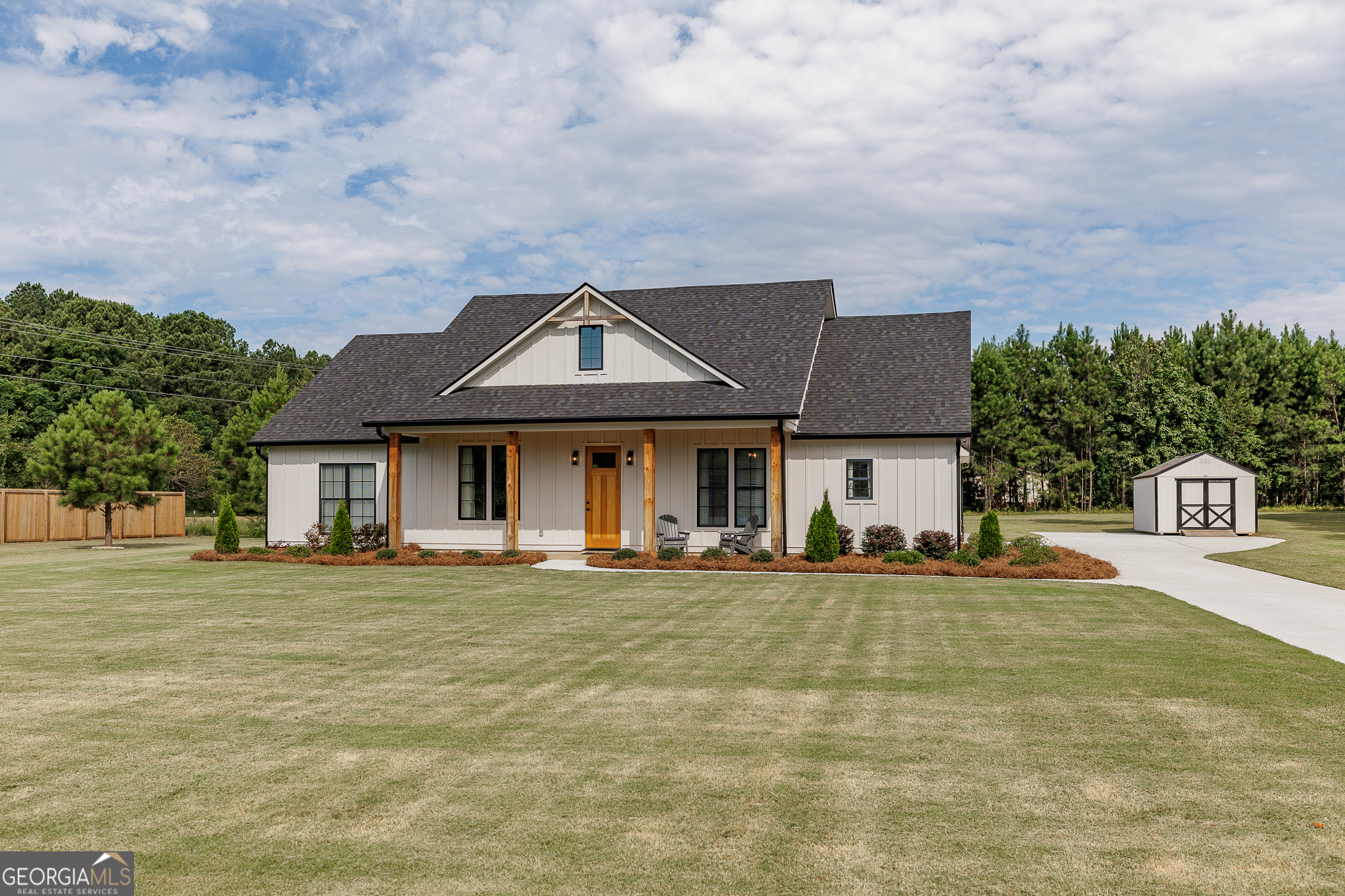 Welcome to 105 Tim Lane in Winterville-a newly built 2024 home with inviting curb appeal, quality construction, and beautifully landscaped grounds with an irrigation system. Enjoy crisp fall days on rocking chair front porch or covered patio, complete with an outdoor TV setup perfect for entertaining during football season. Inside, the kitchen is the heart of the home, offering generous space to cook, gather, and connect. Open living areas set the stage for cozy evenings in, while the large, level yard is perfect for kids, pets, and endless backyard fun. Every space at 105 Tim Lane is thoughtfully designed to bring people together. Just minutes from Athens and the University of Georgia, this home offers the ideal blend of small-town character and city convenience. Discover the charm of Winterville-a community where local art, live music, and authentic cuisine are celebrated year-round. Known for its unique markets, festivals, and concert series, Winterville combines Southern hospitality with vibrant culture. From 105 Tim Lane, you'll enjoy easy access to the Winterville Firefly Trail, Little City Diner, Chibugan Cafe, Front Porch Bookstore, and the beautifully restored Marigold Auditorium, just to name a few.