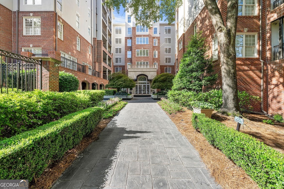Discover the perfect blend of luxury and location in this stunning top-floor condo, ideally positioned between Midtown and Buckhead. From your private oversized terrace, enjoy sweeping city views alongside the Beltline and Bobby Jones Golf Course - all from the comfort of home. Inside, vaulted ceilings create an open, airy feel, while thoughtful upgrades such as custom built-ins, plantation shutters, and walk-in closets in both bedrooms elevate the space. Each bedroom features an en-suite bathroom, tray ceilings, and ceiling fans. The HOA delivers exceptional value with 24/7 concierge service, water, high-speed internet, and a host of resort-style amenities - including a pool, fully equipped gym, clubroom, private park, and a gated parking deck with guest parking and two deeded parking spaces. Located in a quiet, tucked-away neighborhood, this condo offers easy access to walkable restaurants, grocery stores, and top-tier healthcare facilities, ensuring that everything you need is just minutes away. Experience elevated city living - schedule your tour today!