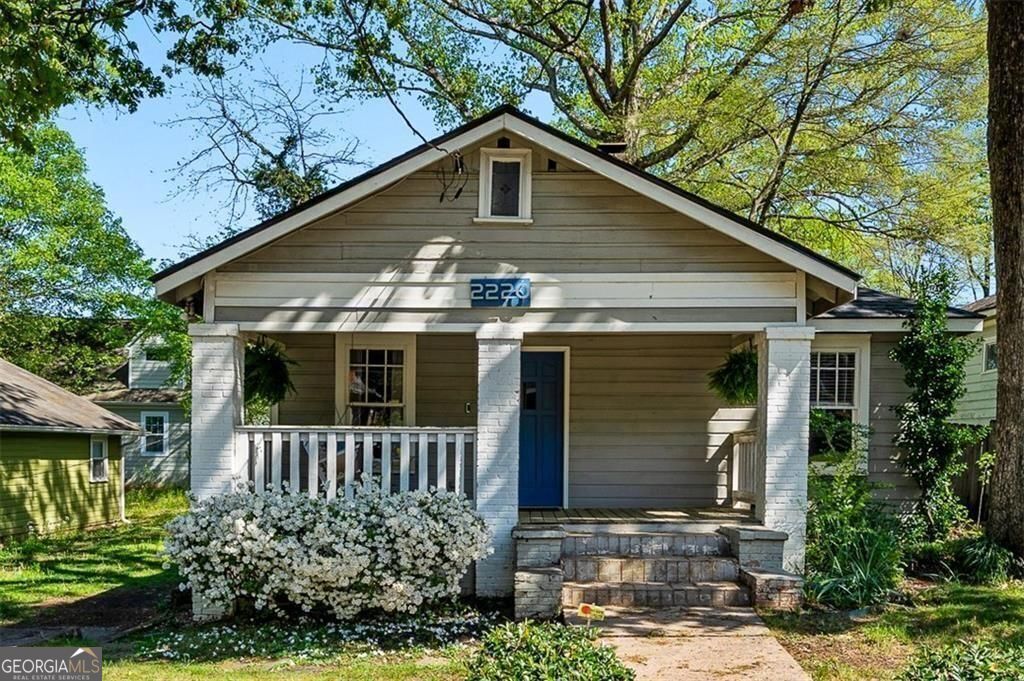 Just in time for the next academic year, a short drive to Georgia State, AUC, and Tech. Enjoy summer celebrations in the large, private backyard! This charming 3 bedroom, 2 bathroom classic 1920s craftsman bungalow in the historic neighborhood of Colonial Hills is just the place to call home. What could be better than relaxing on the front porch swing with a cold glass of sweet tea? Maybe grilling at a cook-out with your besties on the expansive deck in your peaceful backyard surrounded by greenery and beautiful Japanese Maple. For those with a green thumb, a small garden area awaits your blooms or favorite veggies. Love the character of the aged hardwood floors in the main living area, the wood work and crown molding, the decorative masonry fireplaces with an artistic edge in the living room and front bedroom that are period details of homes built in this era, and the cool in-wall ironing board tucked away in the laundry room with the washer/dryer. Living and dining rooms open to kitchen creating an easy flow while entertaining. Primary bedroom offers ensuite bathroom and spacious closet. Relish in the charm of one of our earliest established neighborhoods in Atlanta without the hustle and bustle of city living. Neighborhood staples just a few blocks south on Main St., Oz Pizza, Thumbs Up, Arden's Garden, the list goes on. A few blocks north, Tyler Perry Studios, the breweries and eateries of Lee & White, and Atlanta Beltline. Why drive to the airport when the Marta is smarta and just around the corner? Train gets you there in minutes with no parking hassles. Short commute to Downtown Atlanta. Perfect location for those who appreciate nearby conveniences while enjoying a bit of solitude and a neighbor who I hear has been known to stop by with a plate of hot cooked food. Looking to make this your permanent home? Anything is possible. Application fee $70 for each occupant 18 years and older. Admin. fee $250 at move-in. Call for application details and a private showing!