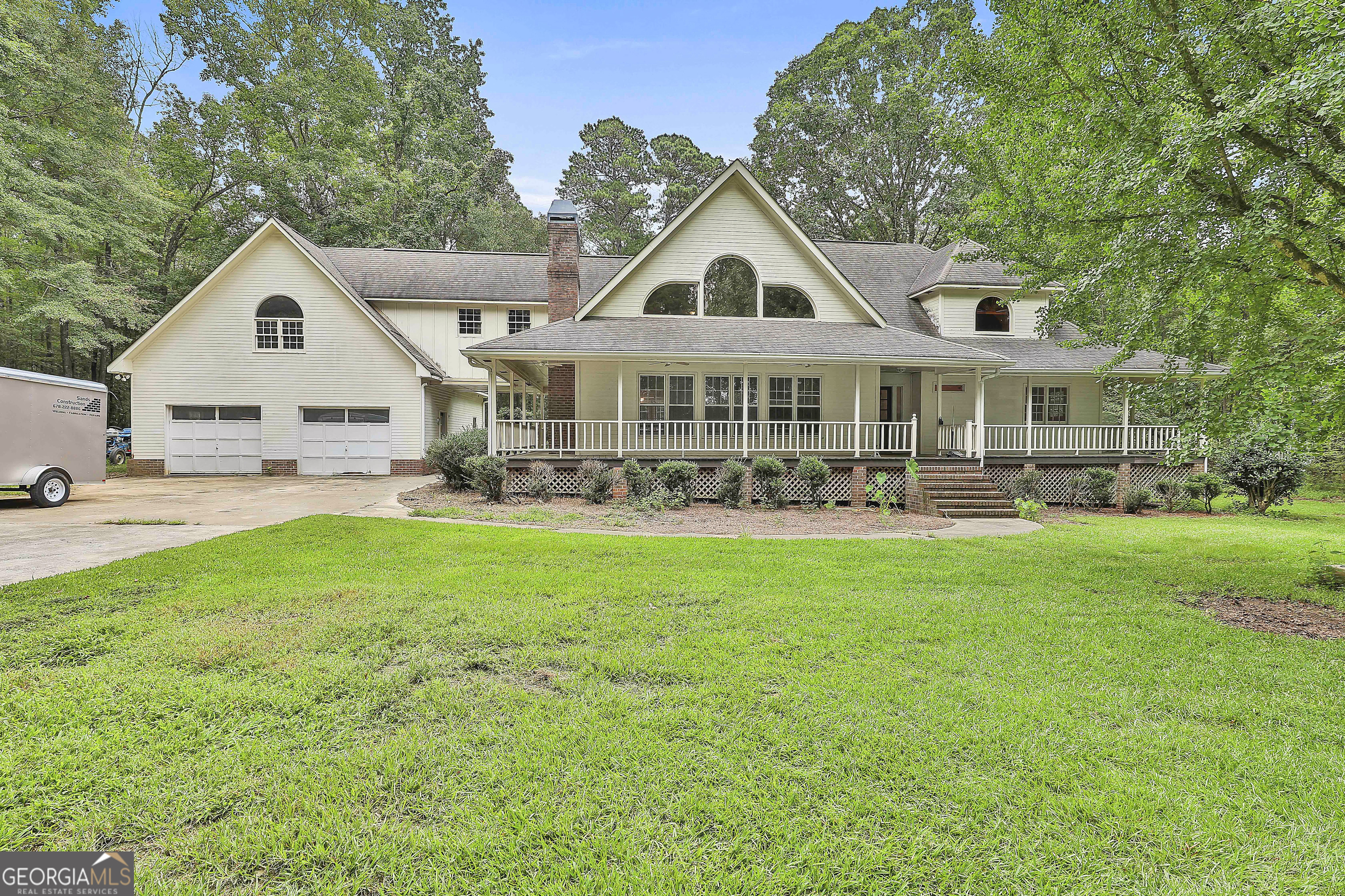 Discover the charm and potential of this 3,200+ sq ft Craftsman-style home, situated on 8+ acres in Tyrone. The land is the real showstopper - 8 mostly open acres with sweeping pasture views, perfect for horses, hobbies, or simply enjoying peaceful country living with room to roam. Mature trees frame the property, adding privacy and a classic Southern backdrop. The home itself provides great bones and timeless Craftsman character, with ample square footage to reimagine and restore. While updates are needed, the possibilities are endless for creating a home that reflects your vision. The location is ideal, just minutes from Trilith Studios, Piedmont Fayette Hospital, Peachtree City, and Fayetteville, with easy access to I-85 for commuting into Atlanta. Due to its current condition, this property is best suited for cash or conventional financing. If you've been looking for land, location, and the chance to put your stamp on a home with character, 161 Ellison Road is ready for its next chapter. **Adjacent 12.8 Acre tract is also available - Lot 2 Ellison Road**