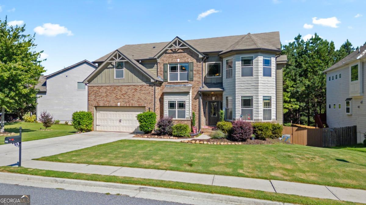 Welcome this lovely home that has just hit the market, offered by its original owners at a great price. This spacious residence features 5 bedrooms and 3 full bathrooms, including a unfinished basement. The kitchen and breakfast area flow seamlessly into the family room, which is enhanced by a cozy fireplace. Off the kitchen, an extended deck with steps leads to a private backyard. The two-story foyer separates the dining room from the formal living room, which could also serve as an office. A convenient bedroom on the main level includes an attached full bath. Upstairs, you'll find a media room perfect for relaxation, along with a large primary suite that boasts a separate shower, a garden tub, dual sinks, and a large walk-in closet. The seller has recently replaced all bedroom carpets with luxury vinyl flooring. This home is ideally situated near swim/tennis facilities and is conveniently located close to Highway 316, less than two miles from the Harbins 316 Shopping Plaza, and close to local parks and walking trails. Please let me know if you have any questions or would like to schedule a viewing.