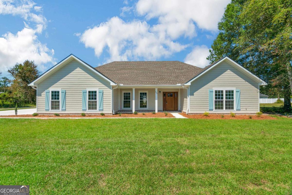 Welcome home to this brand-new construction 4 bed/2 bath home on 0.57 acres in Saddle Cir Subdivision. The craftsman style exterior welcomes you with a beautifully landscaped yard including sod and sprinkler system for instant curb appeal. Inside you'll find a spacious open floorplan with a stylish electric fireplace trimmed in shiplap details located in the living room, which is steps away from the kitchen and dining room. The kitchen features a large coastal blue island with shaker cabinetry, patterned backsplash, stainless steel appliances, and quartz counters. The primary is sure to impress with two walk in closets, and an ensuite bathroom with a dual vanity, soaker tub, and large tiled shower. The secondary bedrooms offer a spacious layout and generous closet space. Don't miss this one!