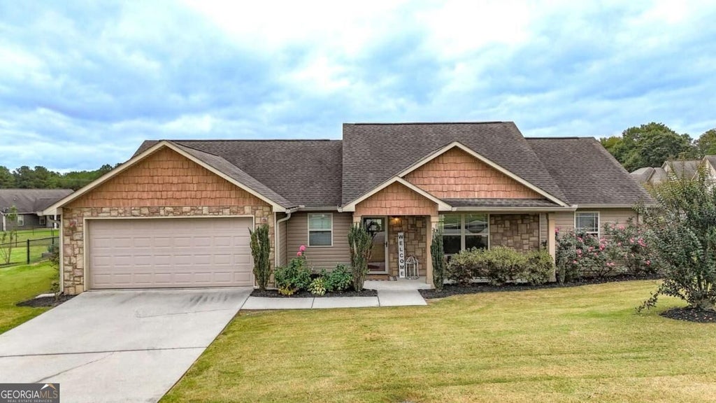 Photo of 210 Madison Drive SW, Calhoun, GA 30701 (MLS # 10840823)