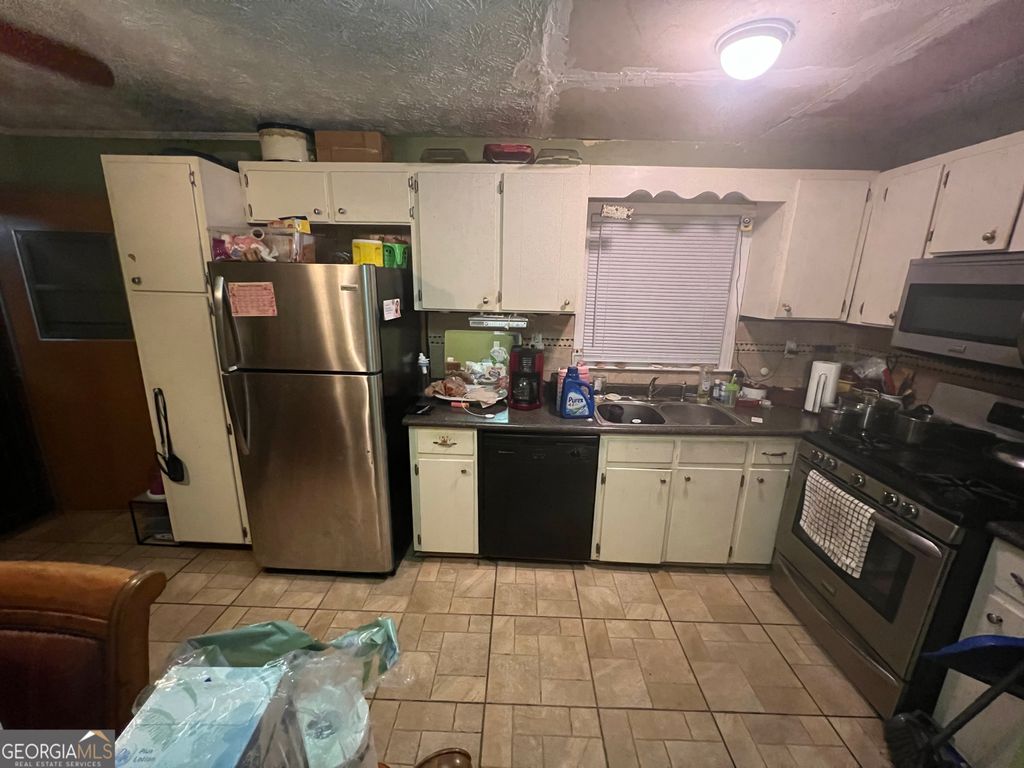 Photo of 4889 Pinedale Drive, Forest Park, GA 30297 (MLS # 10655561)