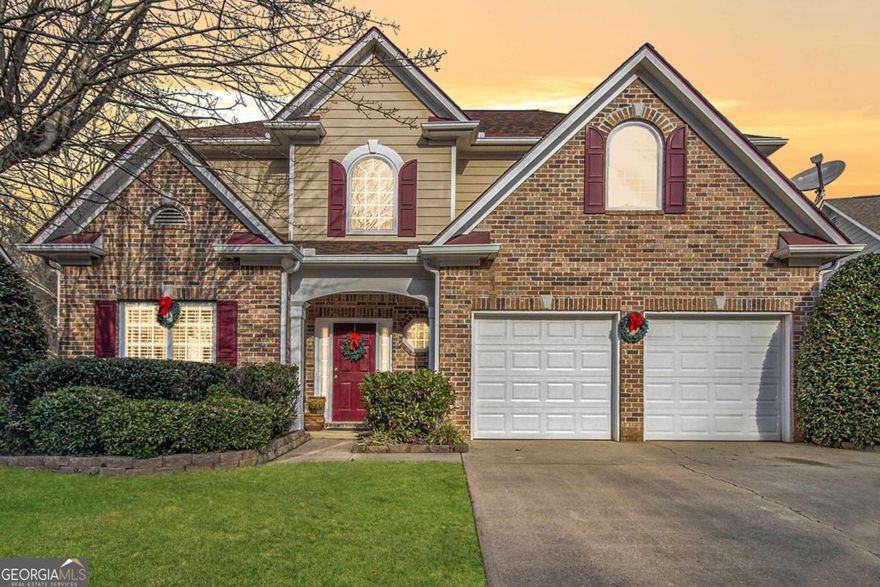 Active East Cobb Community is just minutes from Kennesaw Mountain, Skip Wells Park & Noonday Creek Trail. Inside, a welcoming foyer opens to a spacious living and dining room. The heart of the home is the two-story great room with a striking fireplace and abundant natural light flowing seamlessly into the sunroom. The open kitchen boasts classic white cabinetry, complementary countertops, a pantry, and a breakfast area ideal for casual meals. The oversized primary suite offers a peaceful retreat with a cozy sitting area, a luxurious bath featuring a soaking tub, double vanities, a spacious walk-in shower, and an oversized closet.  Neutral tones throughout the home create a harmonious backdrop, ready for your personal touch. The flat backyard includes a patio perfect for a BBQ or relaxing. Recent updates include a newer roof and HVAC system. Located in Sprayberry High School District. It is excellent for commuters, close to 575 and 75.