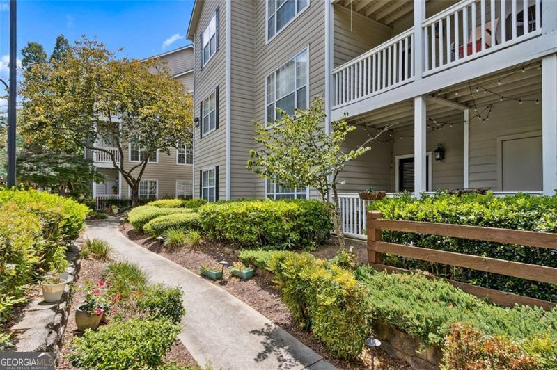 Lifestyle & Convenience Near The Battery and Truist Park Welcome to your new home in this sought-after condominium community where comfort, convenience, and lifestyle come together seamlessly. This beautifully maintained **2-bedroom, 2-bathroom roommate-style floor plan** is designed with both function and flexibility in mind. The **open-concept layout** creates an inviting flow from the spacious family room into the dining area and kitchen, making it perfect for entertaining friends or simply enjoying your everyday living. Natural light pours in through bright windows, creating a cheerful, airy feel throughout the home. Step outside to your **private balcony overlooking serene wooded views**-a peaceful retreat that feels tucked away while still being right in the heart of everything. With its close proximity to the **pool and tennis courts**, you'll love how this unit combines privacy with quick access to community amenities. The **modern tankless water heater** ensures efficiency, while thoughtful upkeep means this home is truly move-in ready. **Location, Location, Location!** Just about a mile from **The Battery**-with its incredible shopping, dining, and entertainment options-and about a mile from **Truist Park**, you'll enjoy world-class baseball, and year-round events practically in your backyard. *Community Features:** * Sparkling pool with lounge area * Tennis courts for staying active * Outdoor grilling station for gatherings * Dedicated car wash station with vacuum area for convenience **Agent Notes:** * HOA rental cap of **25%** with a short waitlist (per HOA) * **No water deductible issues**-conventional financing available This home offers not just a residence, but a lifestyle. Whether you're a first-time buyer, downsizing, or searching for the perfect investment opportunity, this condo checks all the boxes.