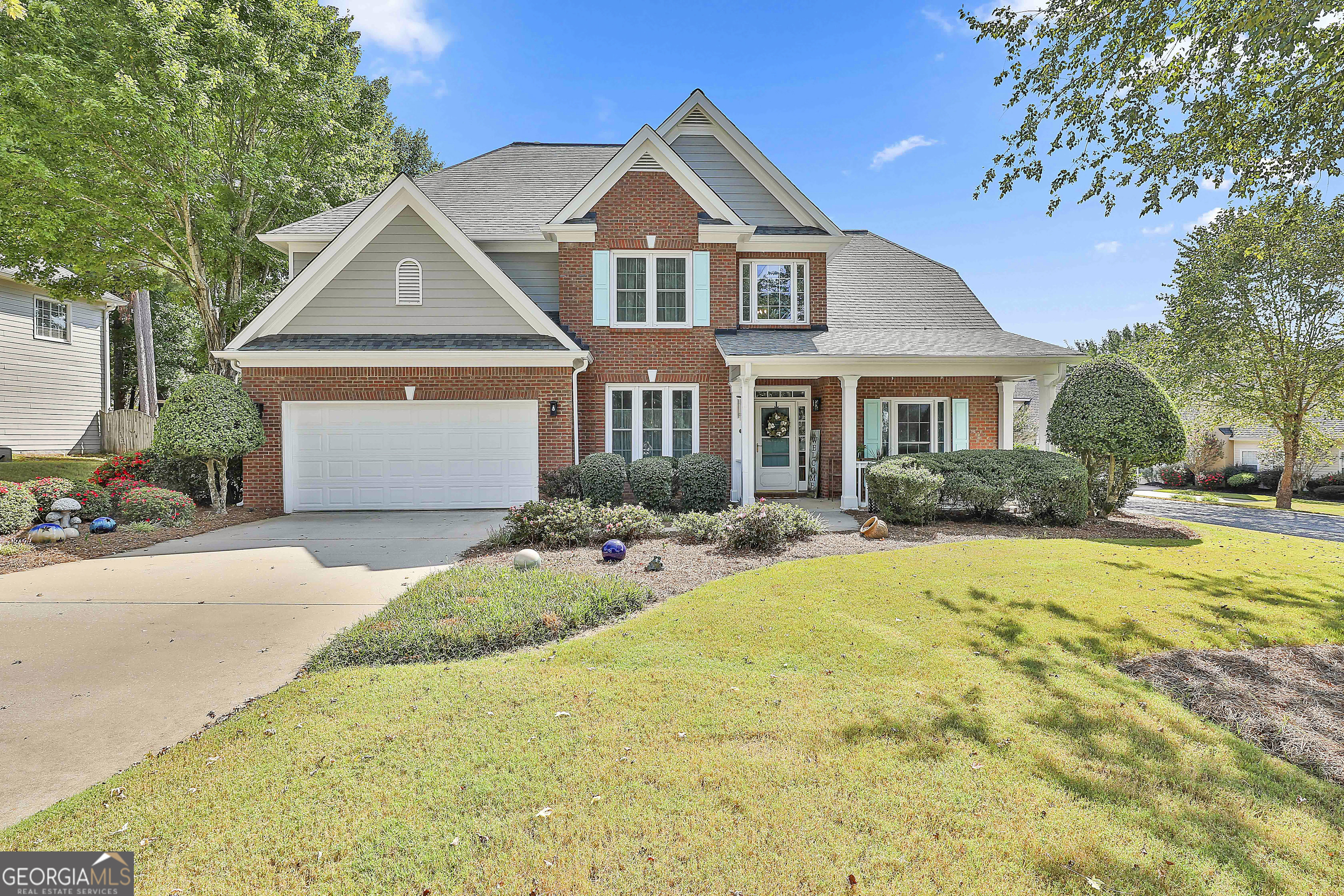 SPECTACULAR FAMILY HOME W/ NEW UPDATES & GORGEOUS PRIVATE BACKYARD!! Walk to Lake & Park w/ this great location... Lots of care has been put into this home featuring formal Dining rm + Living rm that could be a perfect "work from home" office. Pretty NEWer hardwood floors on the main Lead throughout most of main living areas. Kitchen with tall cabinets and unique backsplash. All Appliances remain inc. Frig + the stove is stubbed for gas. The breakfast bar opens to the vaulted family rm, cozy fireplace + light filtering ALL NEW WINDOWS. Guest bedrm on main is perfect for visitors. Gorgeous hardwood treads lead to 3 lg bedrms upstairs featuring NEW Carpet & upgraded pad - feels so nice to walk on. Spacious primary suite w/ trey ceiling & sitting area + walk-in closet. Secondary bedrms w/ good sized closets & double entry bathrm for extra convenience. All NEW LIGHTING & FANS for that "On trend look." The Best is yet to come w/ Outdoors featuring Patio w/ Pergola & Sun Setter retractable awning. Enjoy the lush lawn & level backyard w/ an abundance of flowering azaleas + other blooming perennials. A hedge around the fence offers the privacy you are looking for. Level Driveway & level front yard w/ inviting Bench perfect when waiting for the kids to come home. NEWER Roof (2018) NEWer AC units (2020) & NEW Hot Water Heater (2024). Just minutes away to the 100 acre lake and five acre Oak Park! Enjoy Summergrove's Fabulous amenities to include 3 Pools, 100 acre Lake, Tennis, Pickleball, Golf Course, Club House & Sidewalks! Quick access to shops/restaurants of Ashley Park, Hospital, I-85 & Atlanta Airport.