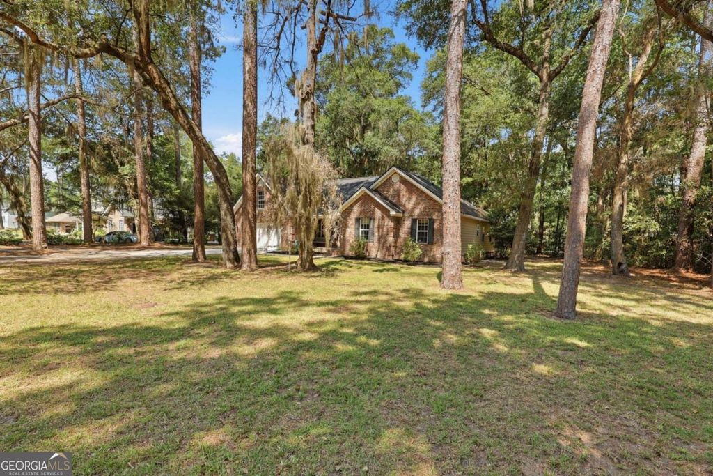 Photo of 1002 Belle Island Road, Richmond Hill, GA 31324 (MLS # 10785521)