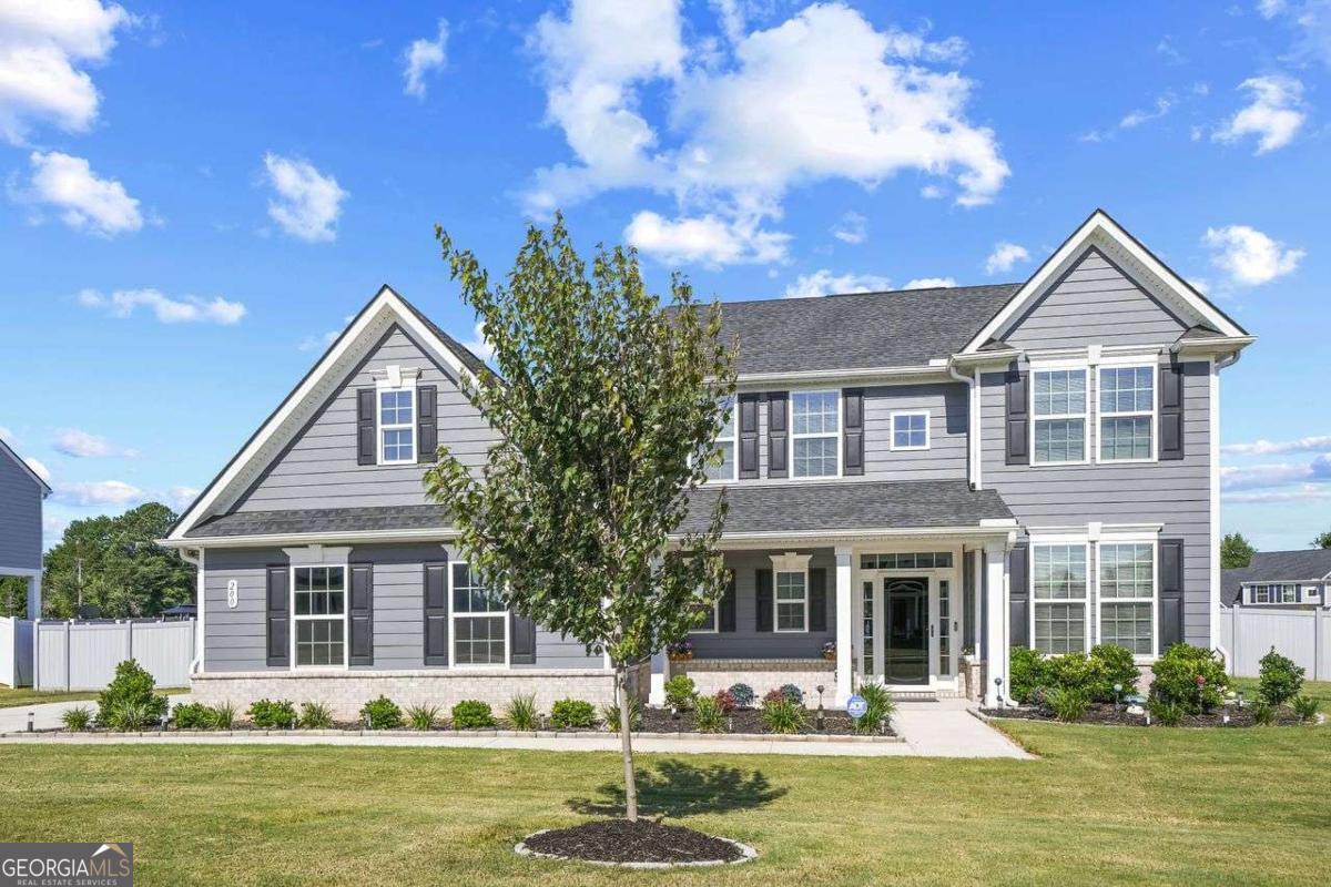 Welcome to a rare opportunity to own a like-new, end unit home in the sought-after Edinburgh community. This spacious 4-bedroom, 2.5-bath residence features a thoughtful layout that blends modern upgrades with comfortable living-all on one of the largest lots in the neighborhood. Step inside to an inviting foyer that leads to a bright, open-concept living area, ideal for everyday living and entertaining. The main level includes a luxurious owner's suite with two walk-in closets and an elegant ensuite bath featuring an oversized walk-in shower and upscale finishes-your own private retreat. The upgraded kitchen offers 42-inch espresso cabinets, quartz countertops, stainless steel appliances, and plenty of space for cooking and gathering. A formal dining room and a cozy breakfast area provide both elegant and casual dining options. Upstairs, you'll find a large loft/bonus room, perfect for a media room, home office, or play space. Three additional bedrooms and a full bath complete the second floor, offering comfort and flexibility for family or guests. Outdoor living is just as impressive with a fully fenced backyard that offers privacy and room to relax, garden, or entertain. A convenient outdoor shed adds extra storage, and the expansive yard is one of the largest in the community. With its modern features, smart layout, and unbeatable lot size, this home truly stands out. Whether you're looking for first-floor living, top-rated schools, or outdoor space to enjoy year-round, this property checks all the boxes. Don't miss your chance to own this exceptional home in Edinburgh-schedule your private tour today.