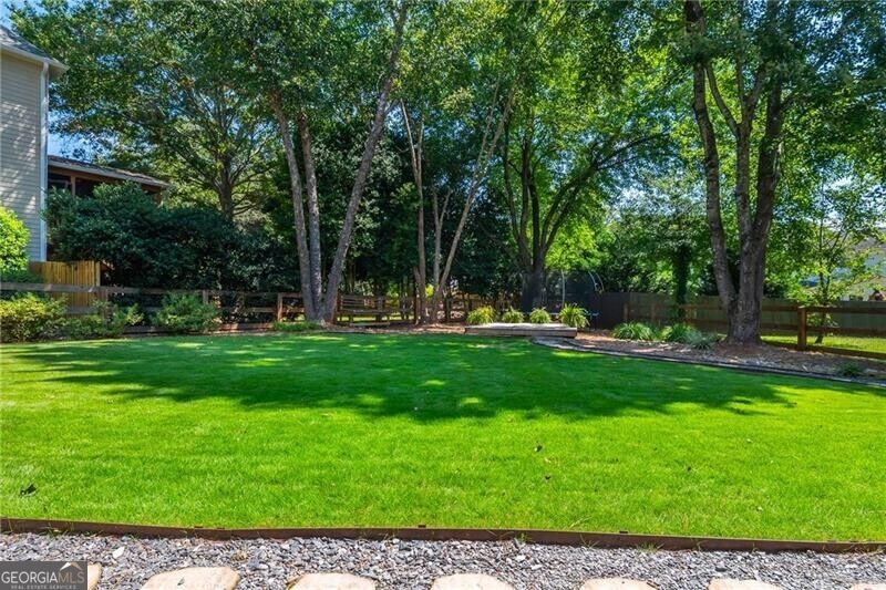 Photo of 100 Cobblestone Way, Alpharetta, GA 30009 (MLS # 10842064)