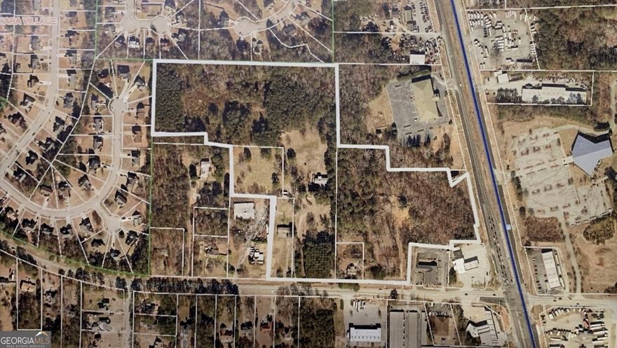 DEVELOPMENT OPPORTUNITY: 1506 Mundy's Mill Rd, Jonesboro, GA  Unlock the Potential of a Prime Mixed-Use Site    Located in the heart of Jonesboro, Georgia, 1506 Mundy's Mill Rd offers a unique opportunity for developers to capitalize on a growing market. This 22.46+ acre property combines strategic location, flexible zoning, and excellent accessibility, making it an ideal site for mixed-use developments.  Key Features for Developers   * Zoning Flexibility: 5.9 acres zoned Commercial (MX) and over 16.5 acres zoned Residential, providing the flexibility to create a dynamic mixed-use project.   * Prime Location: Situated just off Highway 1941, ensuring high visibility and easy access for future residents and businesses.   * Public Transit Access: The property is on the MARTA bus line, with a stop conveniently located nearby, enhancing its appeal to commuters.   * Growing Demand: Jonesboro is experiencing significant growth, driven by its proximity to major employment hubs and recreational facilities.    Development Opportunities  This property is a blank canvas for your next major project. Consider developing:   * Mixed-Use Communities that integrate residential units with commercial spaces.   * Apartment Complexes with amenities that attract young professionals and families.   * Townhome Developments that offer a blend of suburban living with urban conveniences.  Why This Property Stands Out   * Strategic Location: High traffic exposure and direct access from Highway 1941.   * Zoning Flexibility: Allows for a variety of development options to meet market demands.   * Public Transit: Enhances the property's appeal to residents who value connectivity.   * Growing Market: Increasing demand for housing and commercial spaces in Jonesboro.  Property Details   * Location: Mundy's Mill Rd & Hwy 1941, Jonesboro, GA   * Total Acreage: 22.46+ Acres   * Zoning: 5.9 Acres Commercial (MX), 16.5+ Acres Residential   * Public Transit: MARTA Bus Stop nearby   * Accessibility: Direct access from Hwy 1941  Includes all parcels :  06064D-A026  1.62 acres     06064D-A005  1.2 acres     06064D-A006  1 acre  06064D-A006Y  11.2 Acres    06064D-A007  0.64 acres    06063C-A001  6.79 acres    Join the Growth in Jonesboro  Don't miss this opportunity to be part of Jonesboro's thriving community. Contact Caroline today to explore how 1506 Mundy's Mill Rd can become your next successful development project.   Phone: 770-265-2191   Email: carolinenic1@att.net    1506 Mundy's Mill Rd - Where Development Meets Opportunity