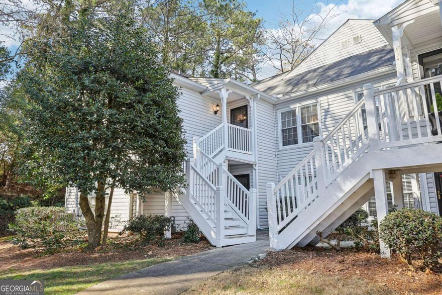 Discover this lovely 2 bedroom, 2 bathroom top-floor condo ideally located just steps from Marietta's Laurel Park. Designed for both comfort and style, the bright and open living space features large windows providing a generous amount of natural light and a cozy fireplace for those relaxed evenings. This roommate-style floor plan features a spacious dining area, sleek kitchen with ample storage and an enclosed den awaiting your personal touch and vision. The primary bedroom offers the ultimate retreat with a private en suite bathroom. The covered balcony is the perfect space for your morning coffee or unwinding after work. Don't miss out on this perfect blend of convenience, comfort and a low-maintenance lifestyle in the heart of Marietta.
