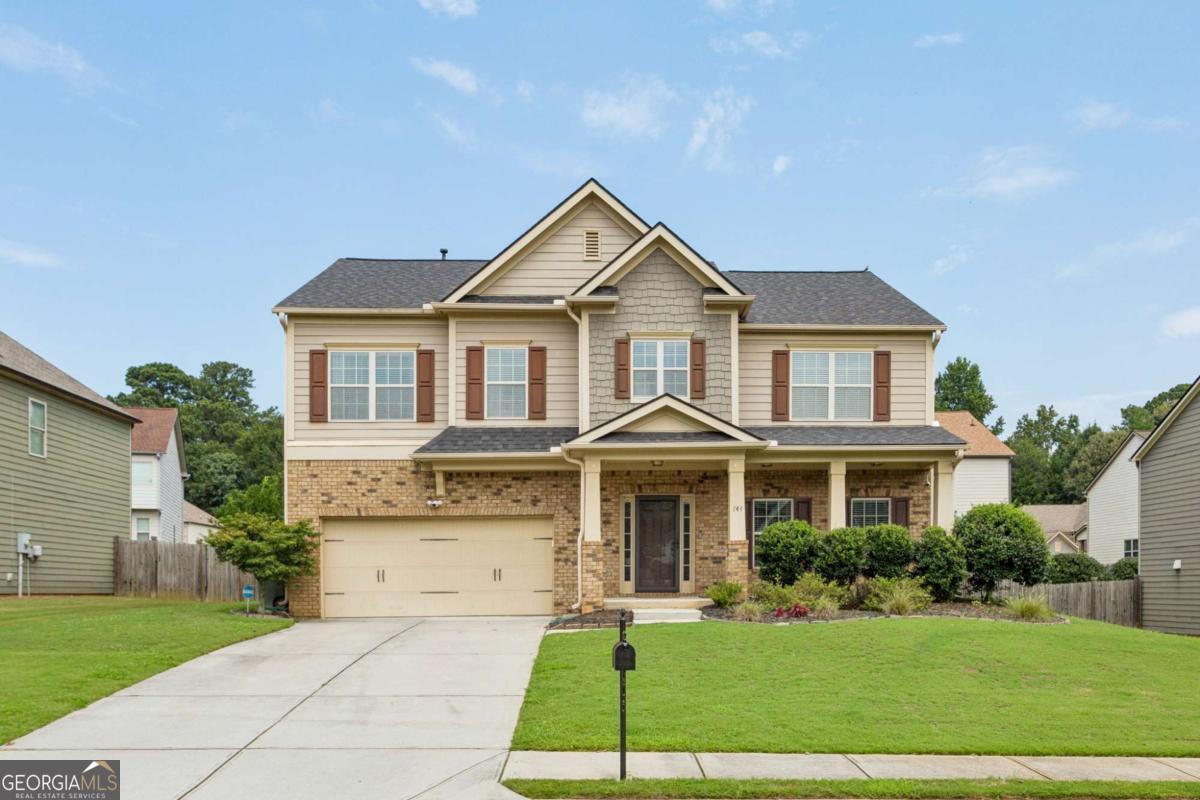 Newer move in ready home in Marietta! 744 Evelyn Lane is newer construction built in 2012 just minutes from Marietta Square. The main floor features upgraded LVP floors, 9' flat ceilings, living room with coffered ceilings, dining with extensive trim detail, open kitchen, large great room with fire place, powder room, coat closet, and large garage with additional overhead storage shelving. The kitchen includes island, granite counter tops, stained cabinetry, stainless steel appliances, gas range, and tile backsplash. Upstairs you find a huge loft that can serve as an extra den, large primary bedroom, huge primary walk in closet, primary bathroom with double vanity, separate tub and shower, 3 additional guest bedrooms, guest bathroom, and laundry room. Additional highlights are newer paint throughout, all plumbing replaced/upgraded with new PEX, front porch, patio extending to private fenced backyard, stair case upgraded to wrought iron spindles, newer roof, and brick and cement fiber board construction. Enjoy easy access to top Cobb County schools, Marietta Square, Kennesaw Mountain and trails, shopping, restaurants, parks, Truist Park, the Battery, I75/285 access, and more.