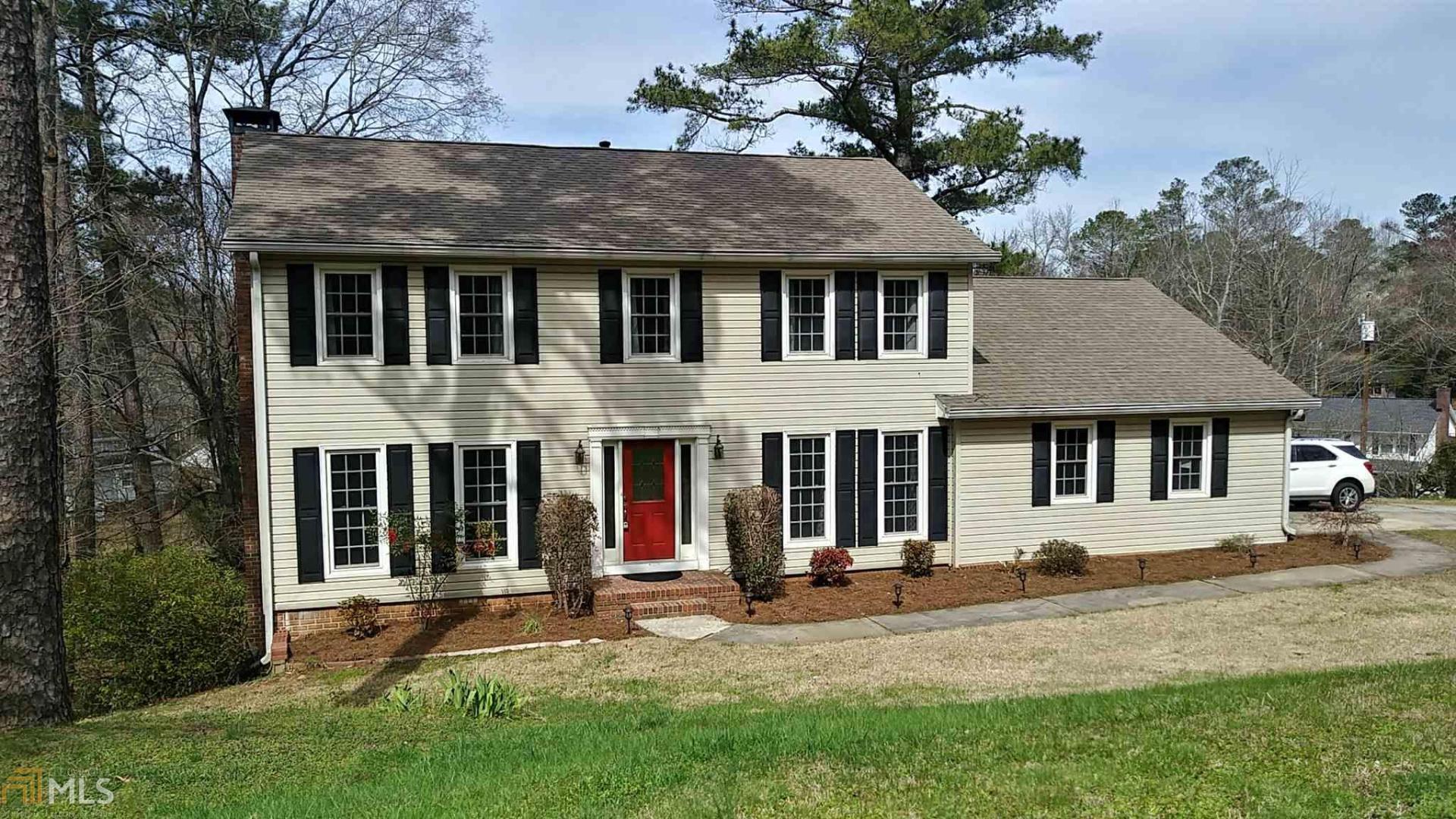 COMPLETE VIDEO TOUR AVAILABLE UPON REQUEST. The perfect family home in East Cobb with NO HOA! LOCATION, LOCATION, LOCATION! Nestled in a quiet neighborhood, yet still close to everything. A few blocks from Barrett Parkway and Town Center Mall! Walking distance to Bells Ferry Elementary, JJ Daniel Middle School, and the Noonday Creek Trail. Also within the very sought after Sprayberry High School district! Brand new carpets and freshened up paint throughout! Close to an acre lot with a fenced in back yard, great for pets! This house is ideal for large families as it comes with 4 amazing bedrooms all on the upper floor, plus a full unfinished basement for TONS of room for everyone to run around. A good sized formal living, formal dining, great room with a massive working fireplace for oversized logs, kitchen, 2 half baths, laundry and breakfast area all on the main floor! Stainless steel appliances. Granite countertops. Gorgeous and plentiful, soft close kitchen cabinets. Large pantry. Bamboo and tile floors on the main. Very large, second story deck with access from both the great room and kitchen, that includes a gas grill that is tied into the house. What else is there? Did I mention CURB APPEAL!! Oh yes, the beginnings of a fruit orchard with newly planted fruit trees! You will treasure this house. It instantly feels like home. Outside and inside. Make an offer today!