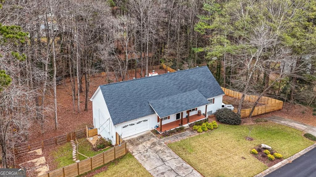 Photo of 1394 Maple Drive, Lilburn, GA 30047 (MLS # 10655750)