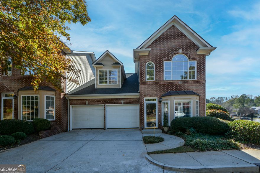 Welcome to this exquisite gated community in the heart of Roswell.  A rare opportunity to own one of the largest floor plans in this fabulous and sought after Sterling Crossville community - only 1 or 2 homes become available each year.  You will be immediately captivated when you enter the home by the dramatic 2-Story Great Room, Fireplace and staircase that leads you to a large open Loft area.  The home welcomes you with abundant natural light coming in from the palladium windows and bay window.  Because it is an end unit, you have extra windows on the side that showers the TH with light.  The main level features an open concept with fresh paint, hardwood floors throughout the first and second level and plantation shutters on every window and door.  The Kitchen is a chef's dream with newer off-white cabinets, granite countertops, tile backsplash, stainless steel appliances, large breakfast bar overlooking an eat-in breakfast nook with a bay window and a Keeping Room.  A door leads you outside to a large fenced in Patio for relaxing over coffee or wine while entertaining your friends.  The oversized Master Suite features a cozy fireplace, sitting area and tray ceilings.  The ensuite Bathroom has been renovated with newer cream cabinets, his and her taller vanities with granite, a step-in tiled shower and a soaking tub.  You will love the large walk-in organized closet.  The four inch crown molding through-out adds a touch of elegance.  The main level has a Powder Room for your guest and a convenient laundry room.  The second level has a large Loft, two spacious bedrooms with jack and jill bathrooms (each bedroom has its own vanity and they share the tub/shower combination and toilet).  Each Bedroom has a walk-in closet.  The Bonus room also has another walk-in closet.  This TH offers you carefree living at its finest with HOA taking care of the grounds/exterior maintenance and an array of desirable amenities including a pool, beautiful pond and fountain, dog park, sitting areas with scenic views, a delightful gazebo and extra parking for your guest!  New roofs installed six years ago with water and trash pickup included in your monthly HOA fees.