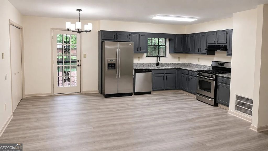 Photo of 6454 W Fayetteville Road, Riverdale, GA 30296 (MLS # 10774651)