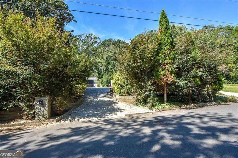 Photo of 6810 Sunny Brook Lane, Sandy Springs, GA 30328 (MLS # 10869249)