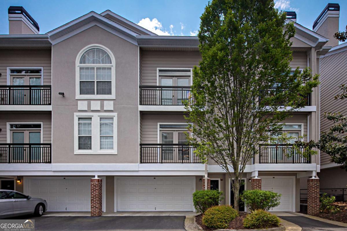 Beautiful 2 bedroom 2 bath town-home. Approximately 1300 saft! LOCATED IN THE BEST SCHOOL DISTRICT IN ATLANTA! Immaculate Hardwood Floors, and recently repainted. 2 Car Parking Garage with plenty of extra space for storage! Top of the line appliances and washer/dryer is included in rent! Private gated community with pool and gym membership all included in the rent! Unit has a Rental Permit! Owner is open to long term flat leases if tenants know that they will be in ATL for a while. EPOXY GARAGE!. Great bargain! Available! October 15th, 2025 and potentially before!