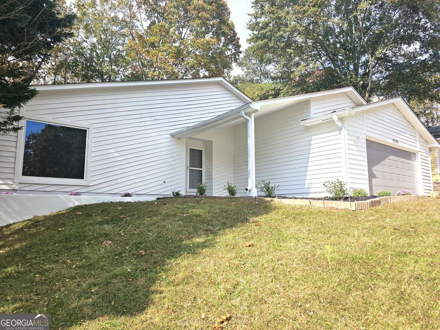 Beautifully renovated 3-bedroom, 2-bath home featuring new windows and flooring throughout. The home offers a completely updated kitchen with white shaker cabinets, white granite countertops, and easy access to the backyard-perfect for everyday living or entertaining. Both bathrooms have been fully renovated with modern finishes. Additional updates include a tankless water heater for energy efficiency. Enjoy a private backyard with a spacious deck, ideal for relaxing or hosting gatherings. The listing agent is a principal of the entity that owns the property and will sign on its behalf. Closing to be handled by Weissman Law Firm.