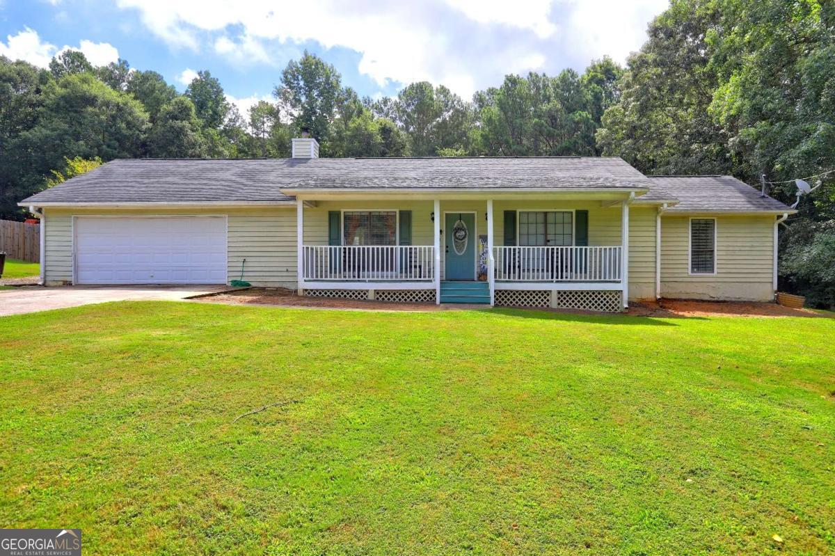 Immediate Income Opportunity! This immaculate and well-maintained ranch-style traditional home is a turnkey investment with a reliable tenant already in place-who would love to stay! Featuring 3 bedrooms, 2 bathrooms, and a spacious two-car garage, this property offers comfort, convenience, and income from day one. Enjoy the peace of mind that comes with a solid tenant history and a home that has been lovingly cared for. The exterior includes a backyard storage shed for added functionality. Whether you're looking to expand your portfolio or move in later, this property is a rare find! This property is located near numerous useful amenities such as the following: SR-155 Access for travel convenience, Dollar General, Gas stations, Pharmacies, Restaurant choices, Parks, Recreation centers, Trails, etc.