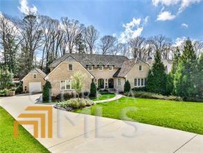 Chastain Park Stunner! Expansive custom home in the heart of the neighborhood. Main level features Master on Main, open modern floorplan with kitchen, family room all open to a walk out backyard with resort style pool and screen porch. Upstairs has 4 large bedroom suites with a central living space. Lower level has private guest quarters, media room, dining area and side yard outdoor space with a fire pit. Seriously one of the best homes around, don't miss out!