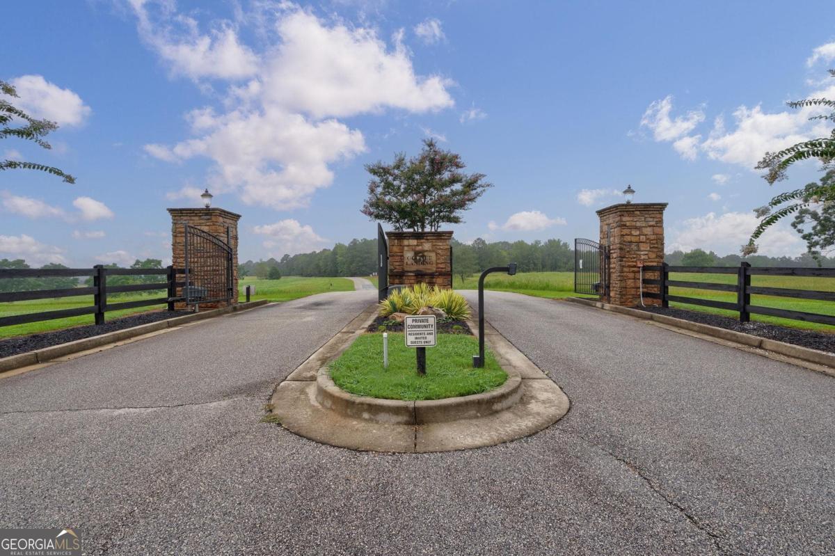 3.21 ACRES WITH LAKE OCONEE ACCESS!! This exceptional 3.21-acre property is located in the gated neighborhood of Oconee Landing-offering the perfect setting for your dream home or a prime opportunity for a builder to create a custom masterpiece. Oconee Landing features a beautifully maintained community area with day docks, a private boat ramp, and designated boat and jet ski storage-all on the sought-after Richland side of Lake Oconee where you are just minutes from Jumping Rock and the Ritz-Carlton. For those wanting even more space, two adjacent lots (43 and 45) are also available for sale, allowing for a combined total of 13.38 acres. Whether you're envisioning a peaceful private retreat or an impressive showcase property, this is a rare opportunity to own acreage with access to the very best of Lake Oconee living.
